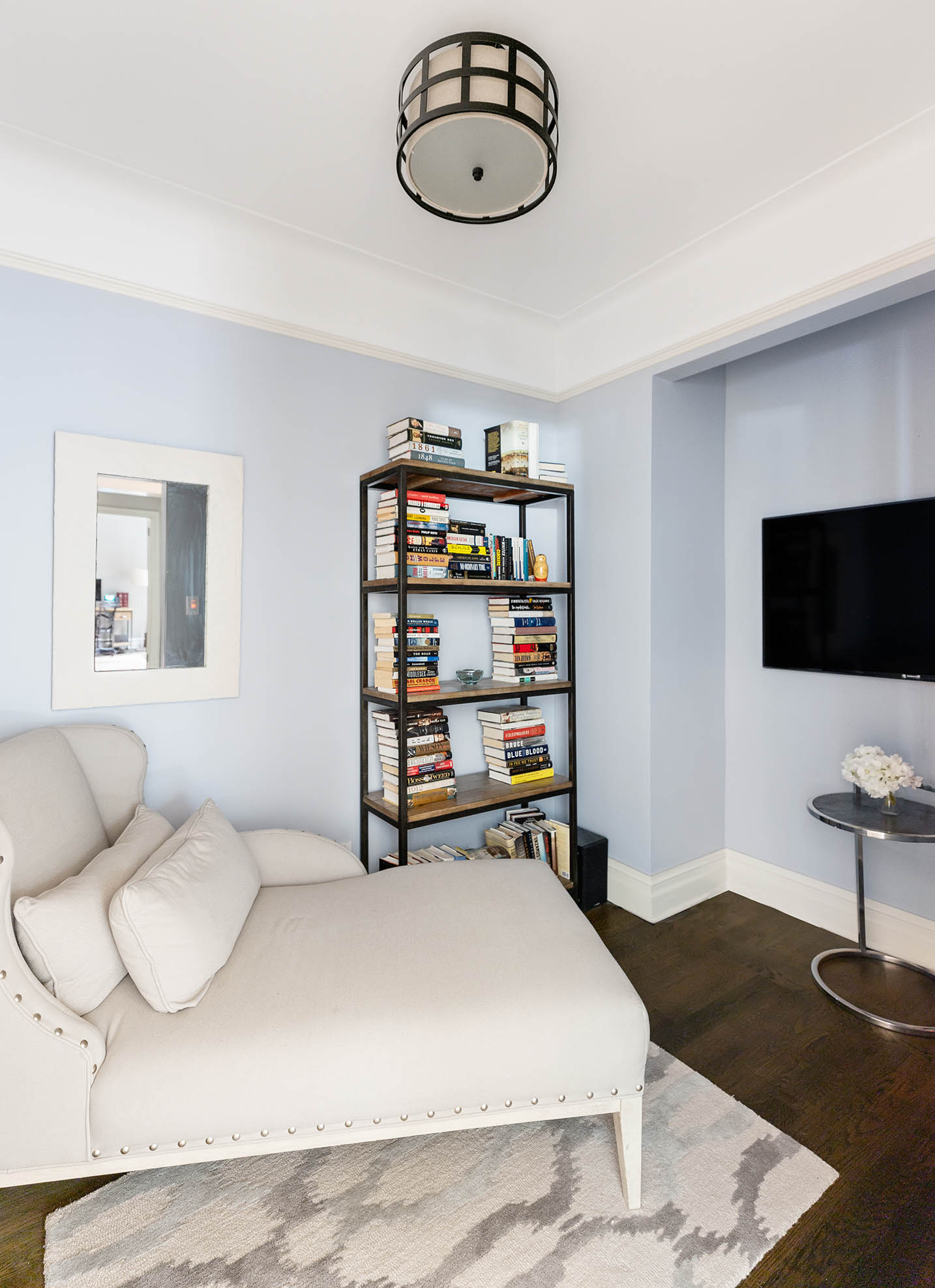 174 West 76th Street, Unit 4GH Manhattan, NY 10023 - Photo 14 of 16 a living room with furniture a flat screen tv and a window