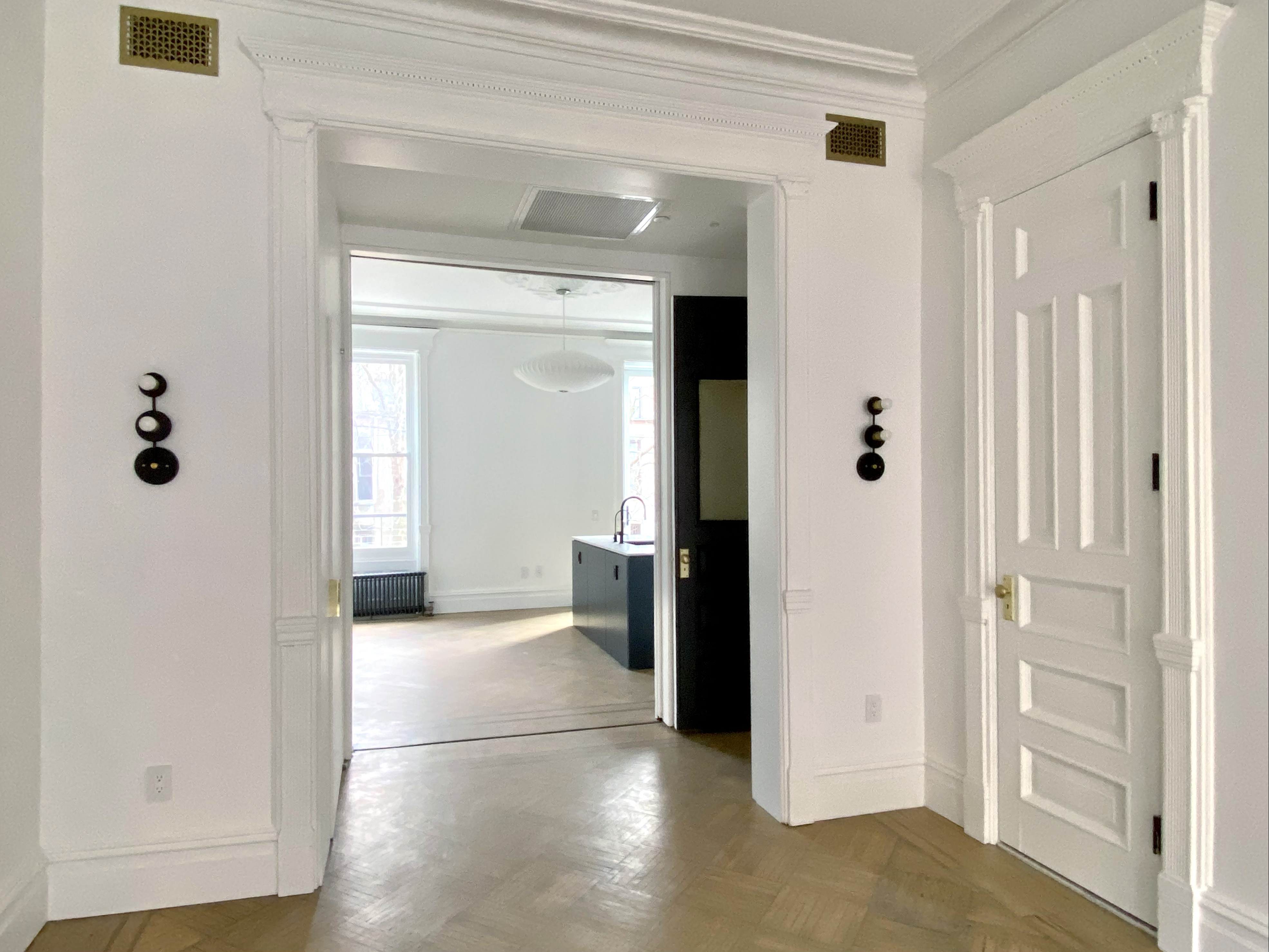 1420 Pacific Street, Unit 1 Brooklyn, NY 11216 - Photo 5 of 30 a view of a hallway with wooden floor and closet