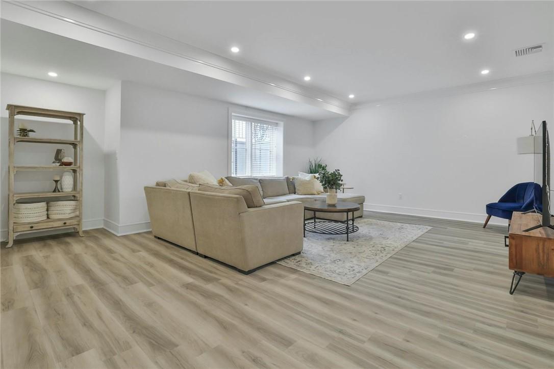 211 Purchase Street, Unit A Rye, NY 10580 - Photo 16 of 22 a living room with furniture and a wooden floor