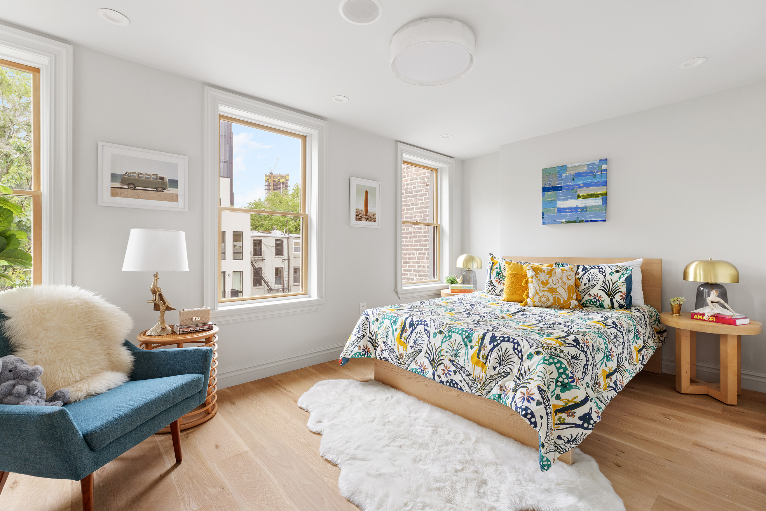 363 Warren Street Brooklyn, NY 11201 - Photo 13 of 23 a bedroom with a bed and wooden floor