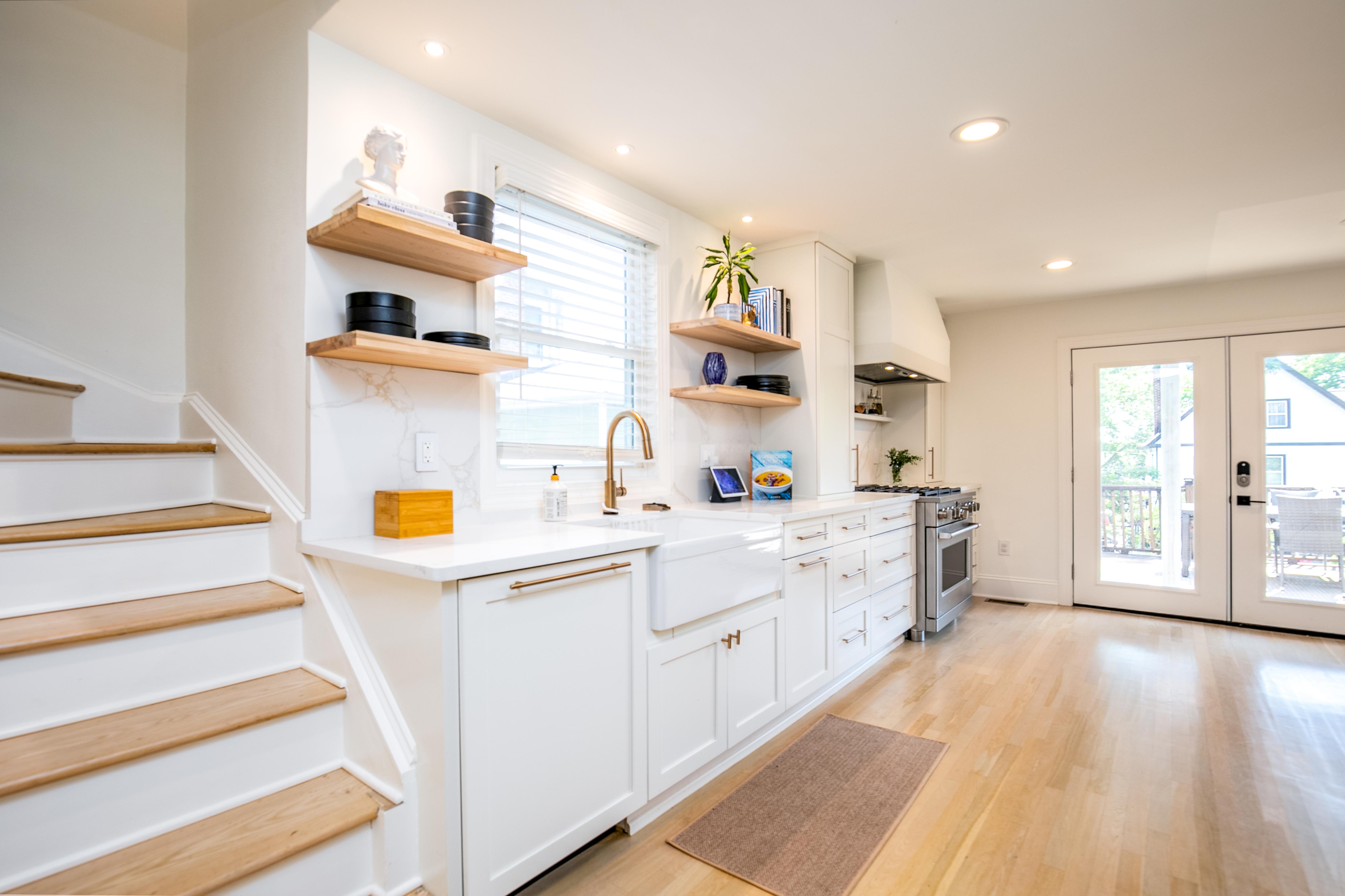 163 Ridge Road Rutherford, NJ 07070 - Photo 22 of 59 a kitchen with counter top space cabinets and outdoor space