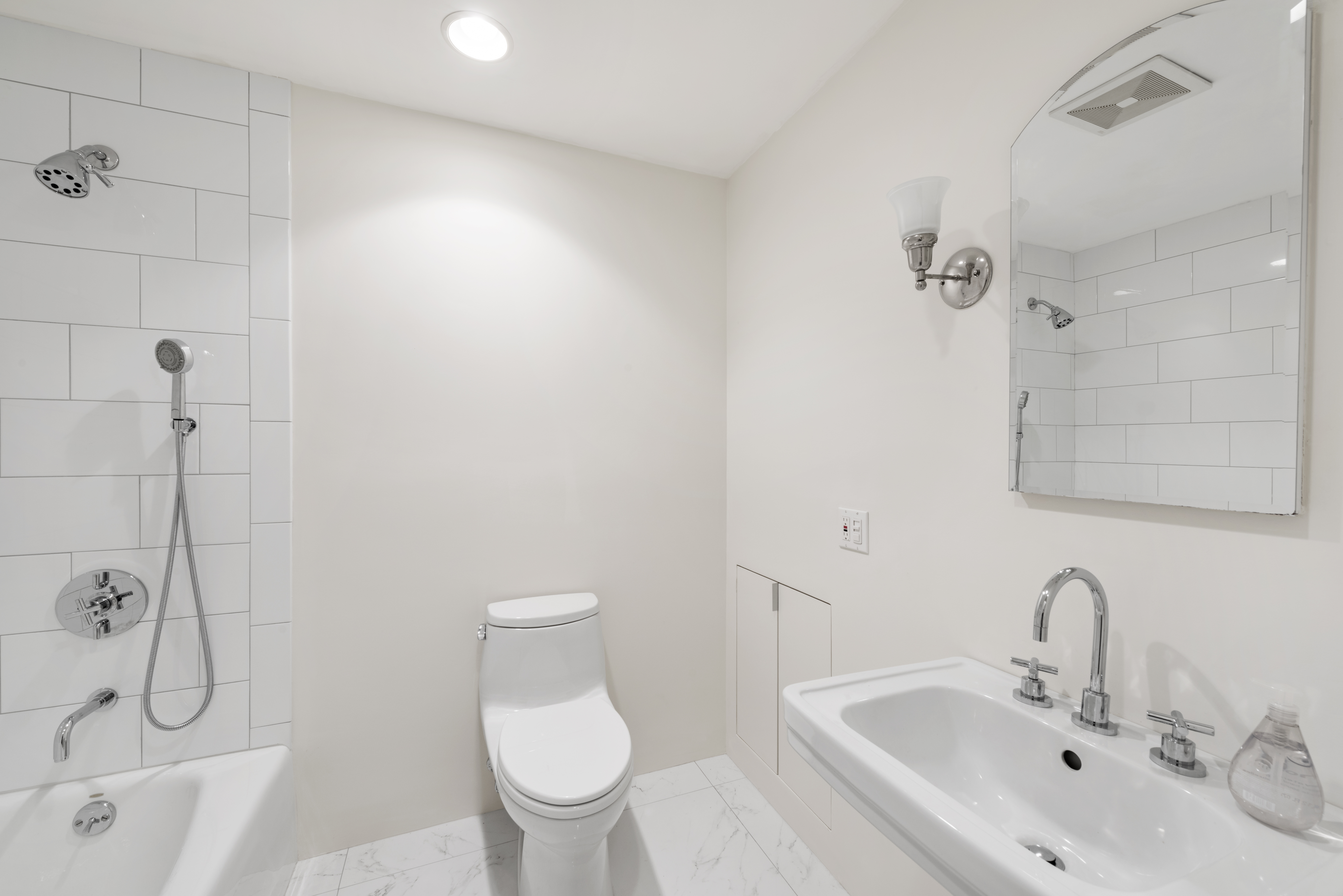 325 West 84th Street, Unit MAIS Manhattan, NY 10024 - Photo 6 of 9 a bathroom with a sink toilet and shower