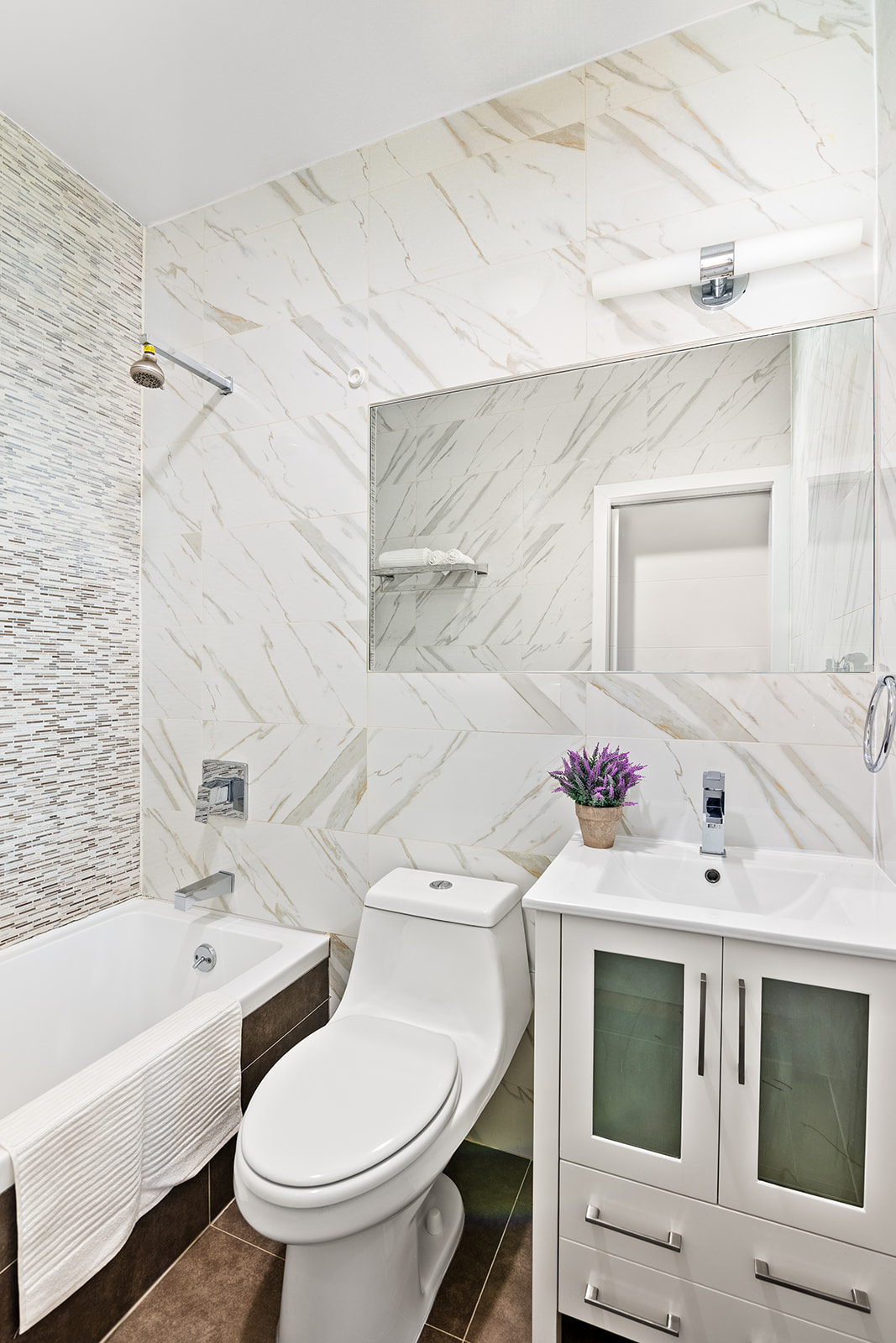 495 Rutland Road, Unit 3 Brooklyn, NY 11203 - Photo 10 of 12 a bathroom with a sink a toilet and bathtub