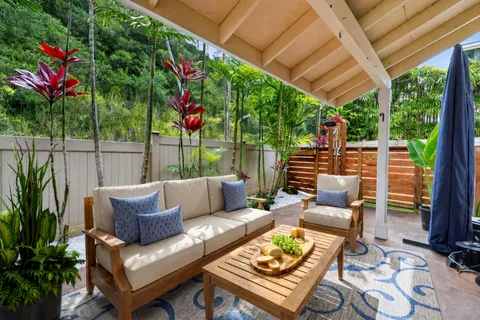 a outdoor living space with furniture and garden view