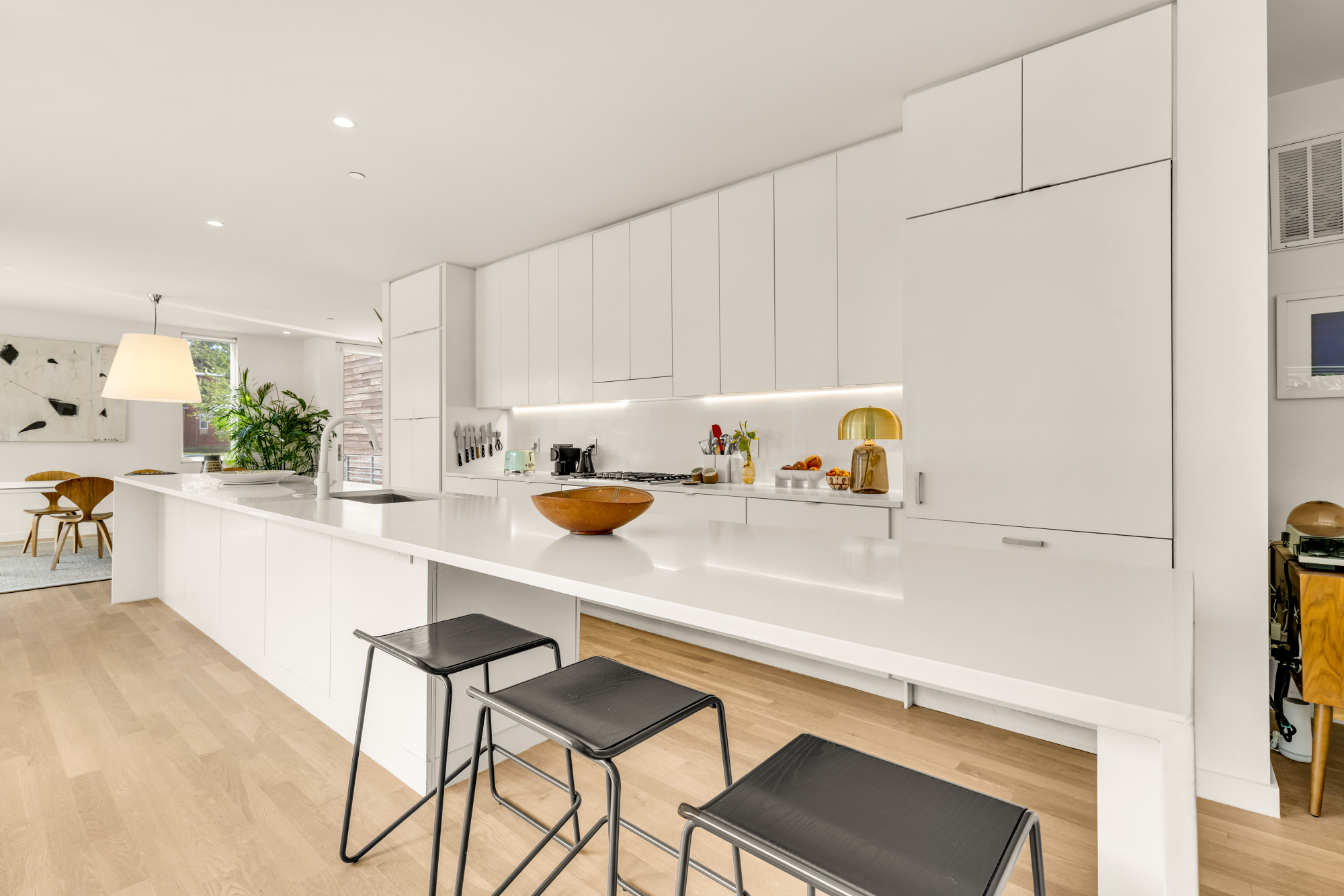 1501 4th Street Northwest, Unit 1 Washington, DC 20001 - Photo 18 of 41 a kitchen with a sink cabinets and white appliances