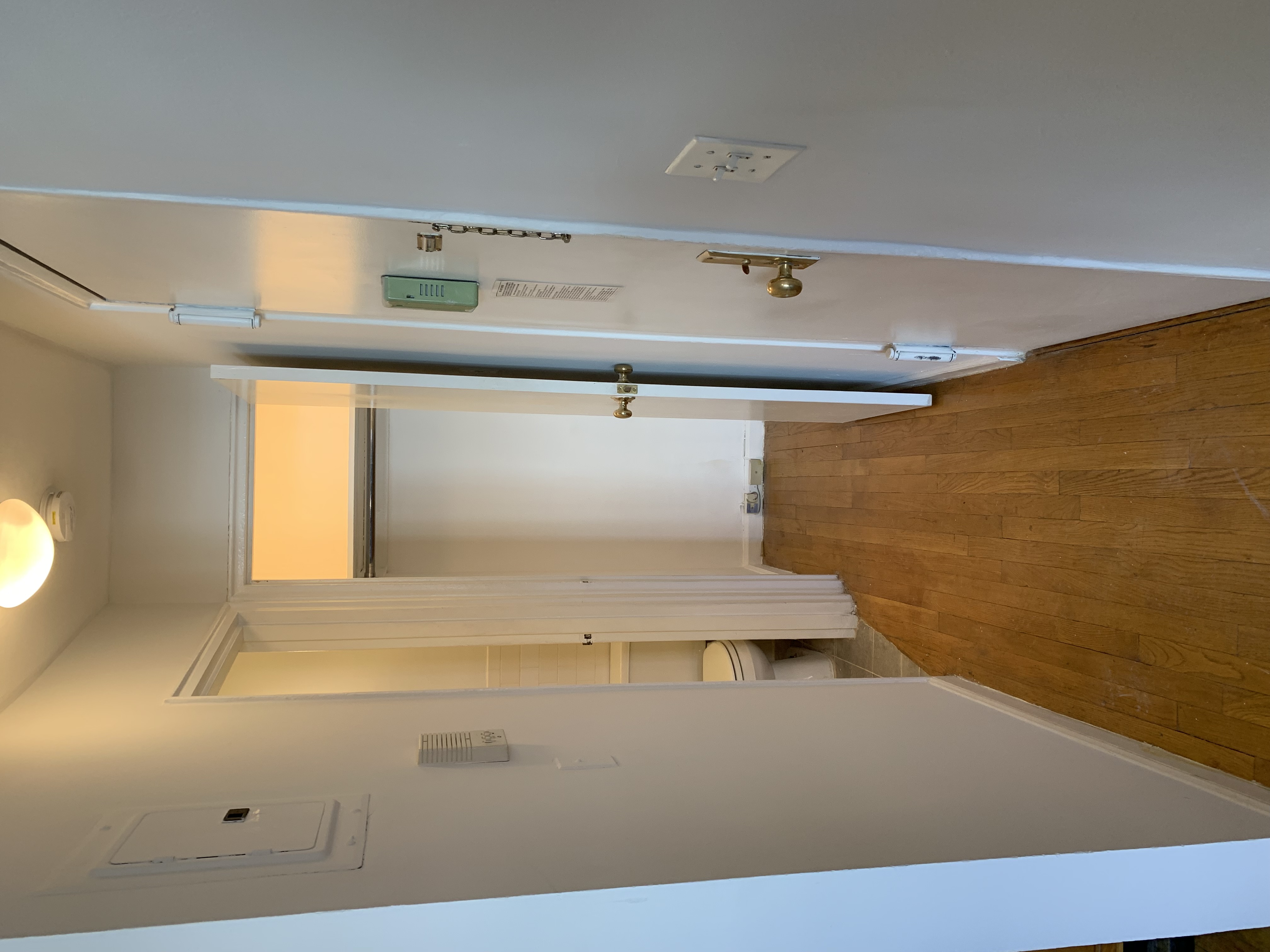 116 West 131st Street, Unit 7 Manhattan, NY 10027 - Photo 4 of 5 a view of a bathroom from a hallway
