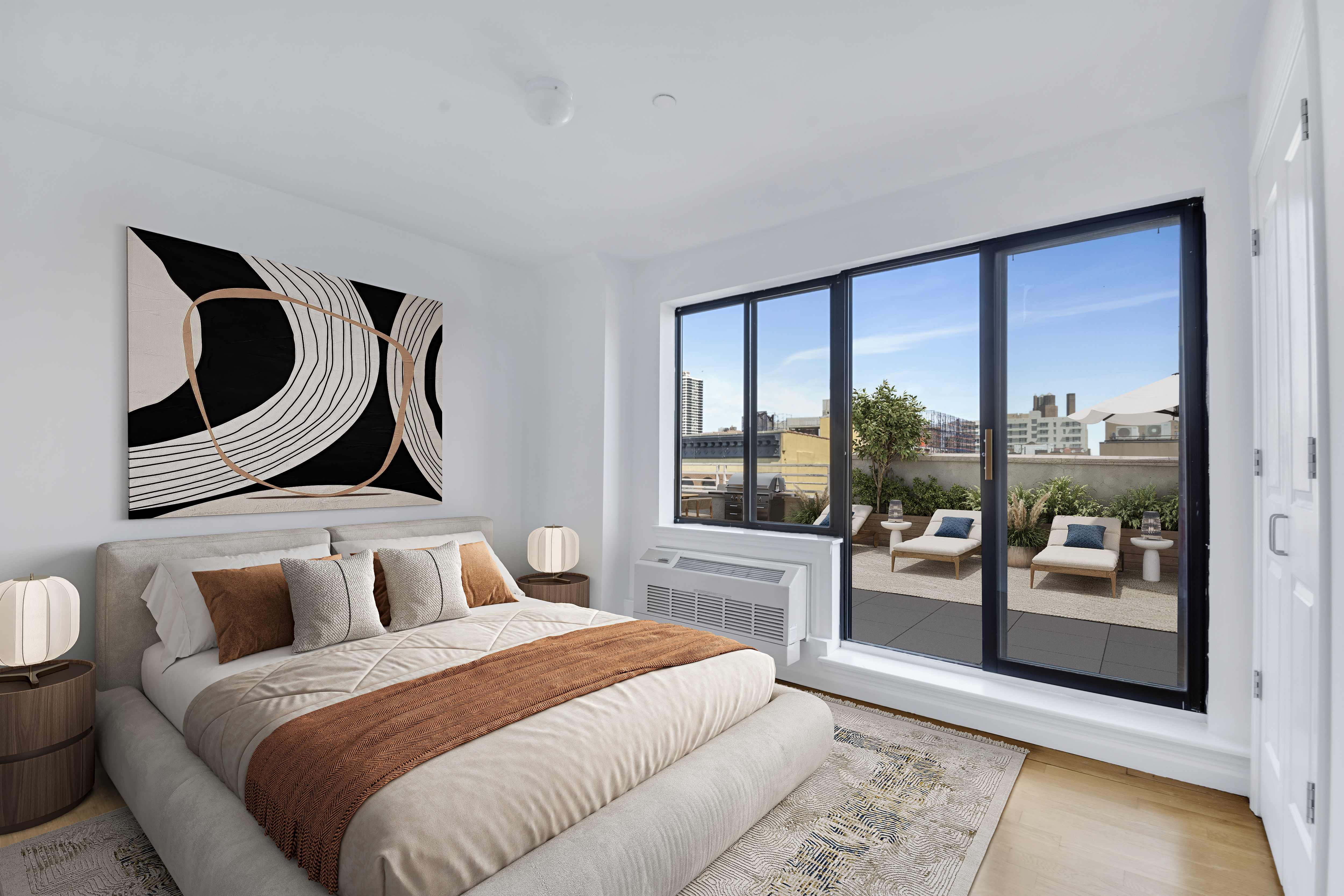 416 East 117th Street, Unit PH6 Manhattan, NY 10035 - Photo 10 of 18 a bedroom with a bed and wooden floor