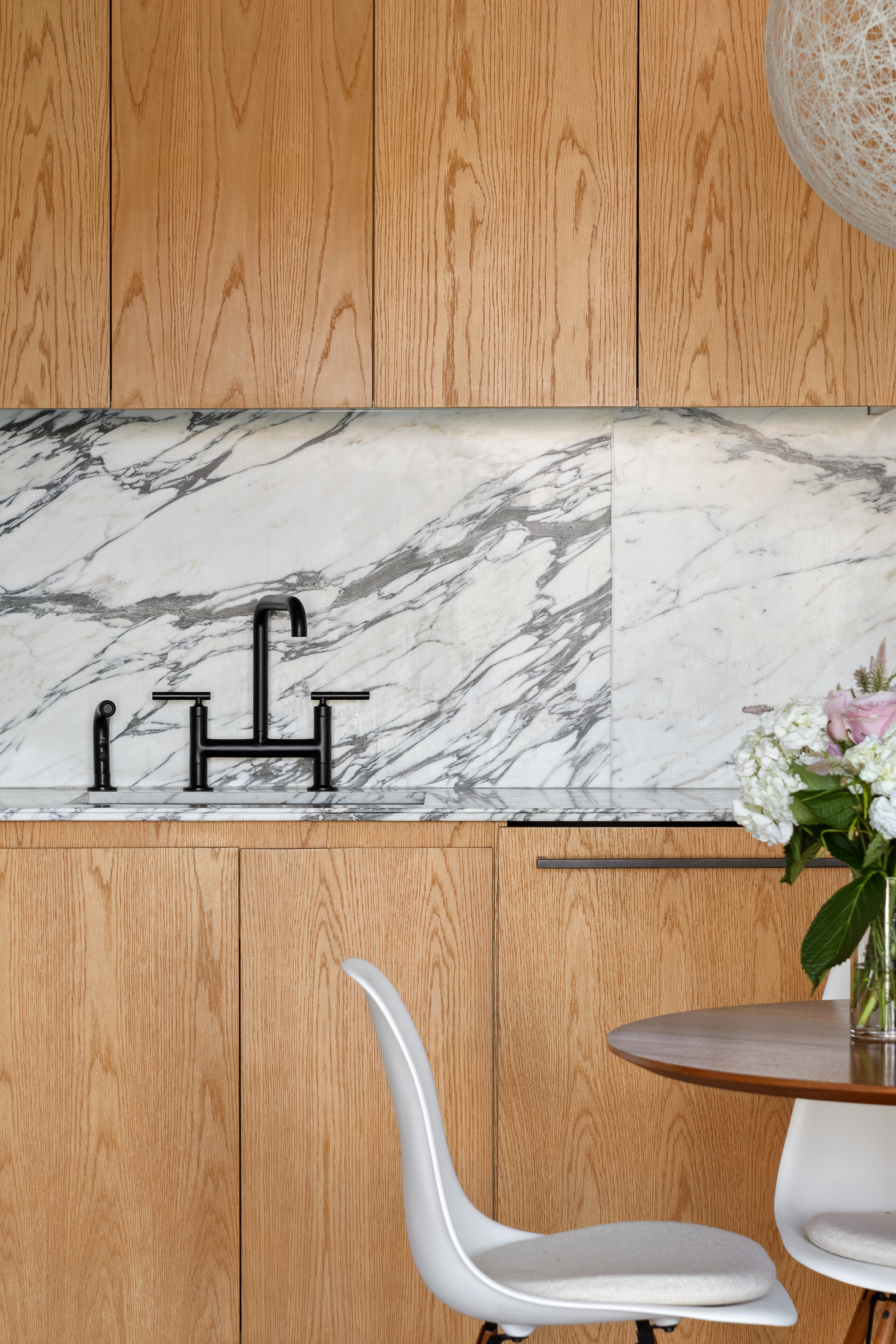 308 North 7th Street, Unit 5A Brooklyn, NY 11211 - Photo 3 of 12 a kitchen with a sink a toilet and a window