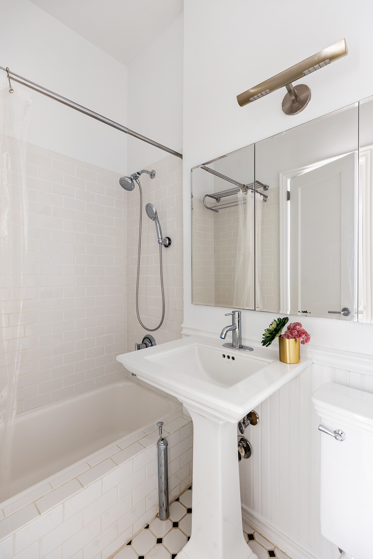 133 West 75th Street, Unit PARLOUR A Manhattan, NY 10023 - Photo 9 of 11 a bathroom with a sink a bath tub and a shower