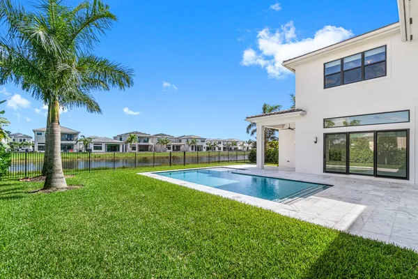 a view of a house with a swimming pool