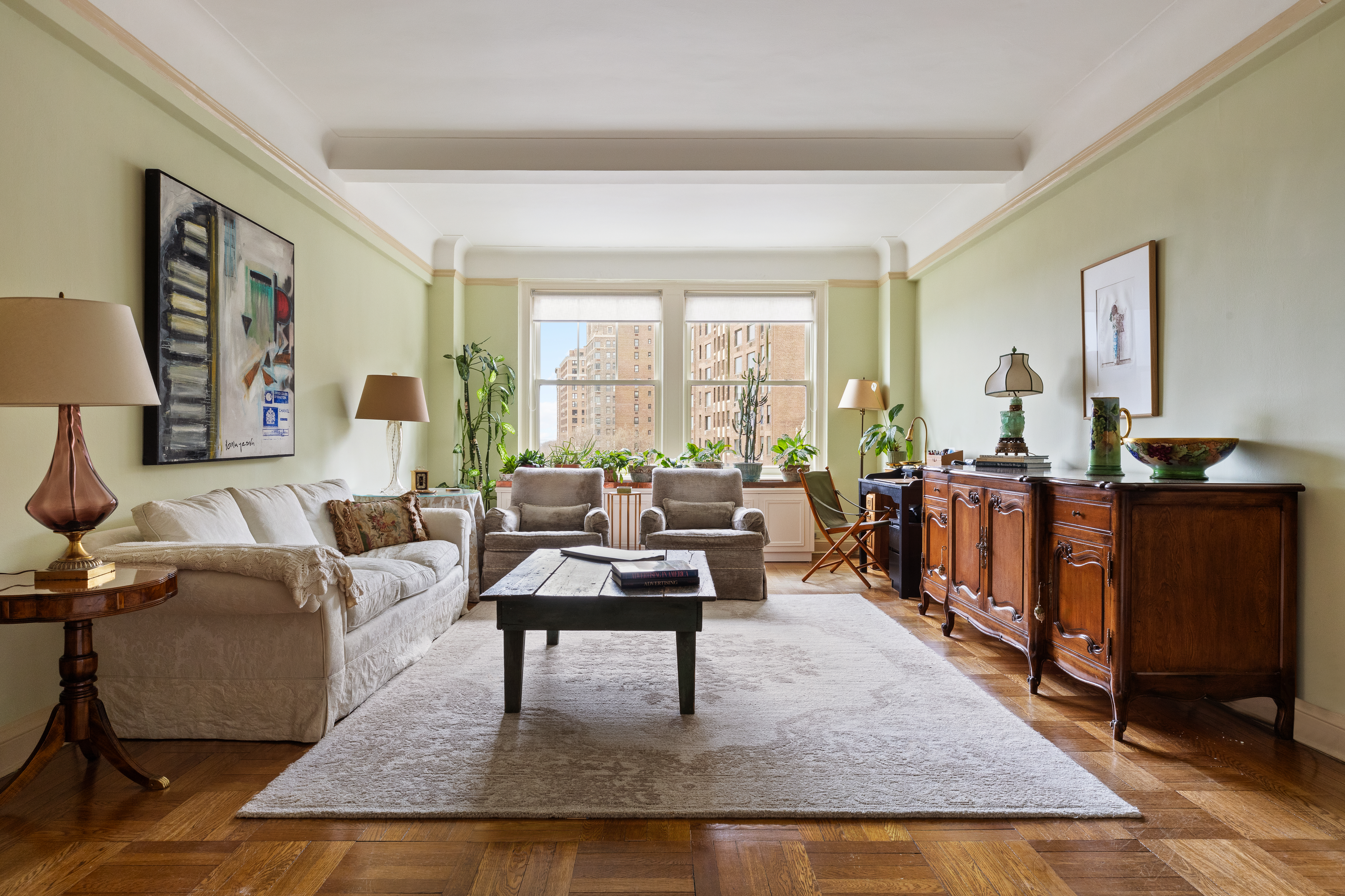 330 West 72nd Street, Unit 7A Manhattan, NY 10023 - Photo 2 of 10 a living room with furniture rug and window