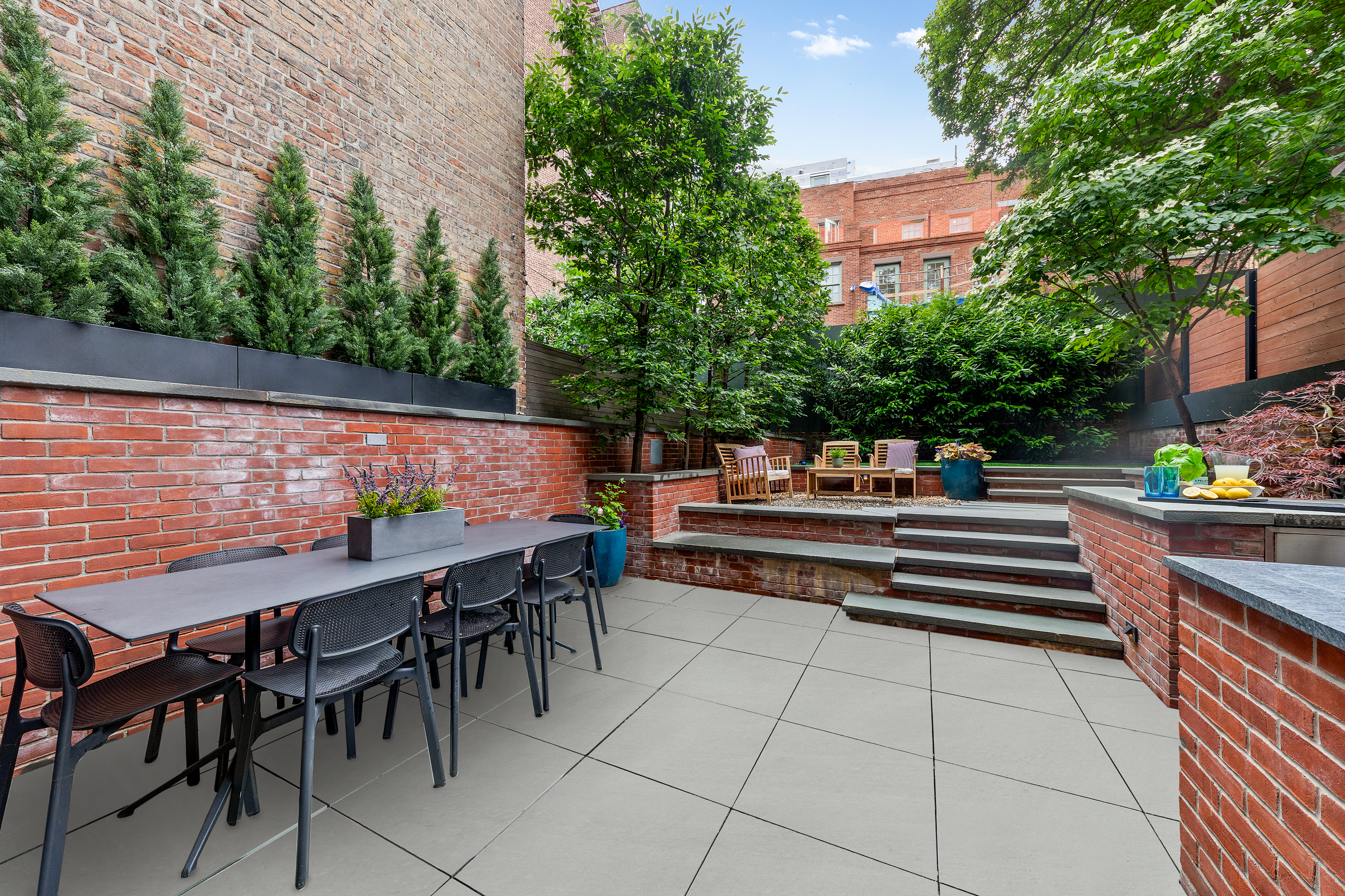 21 Bethune Street, Unit GARDEN Manhattan, NY 10014 - Photo 10 of 12 a outdoor view with a sitting space
