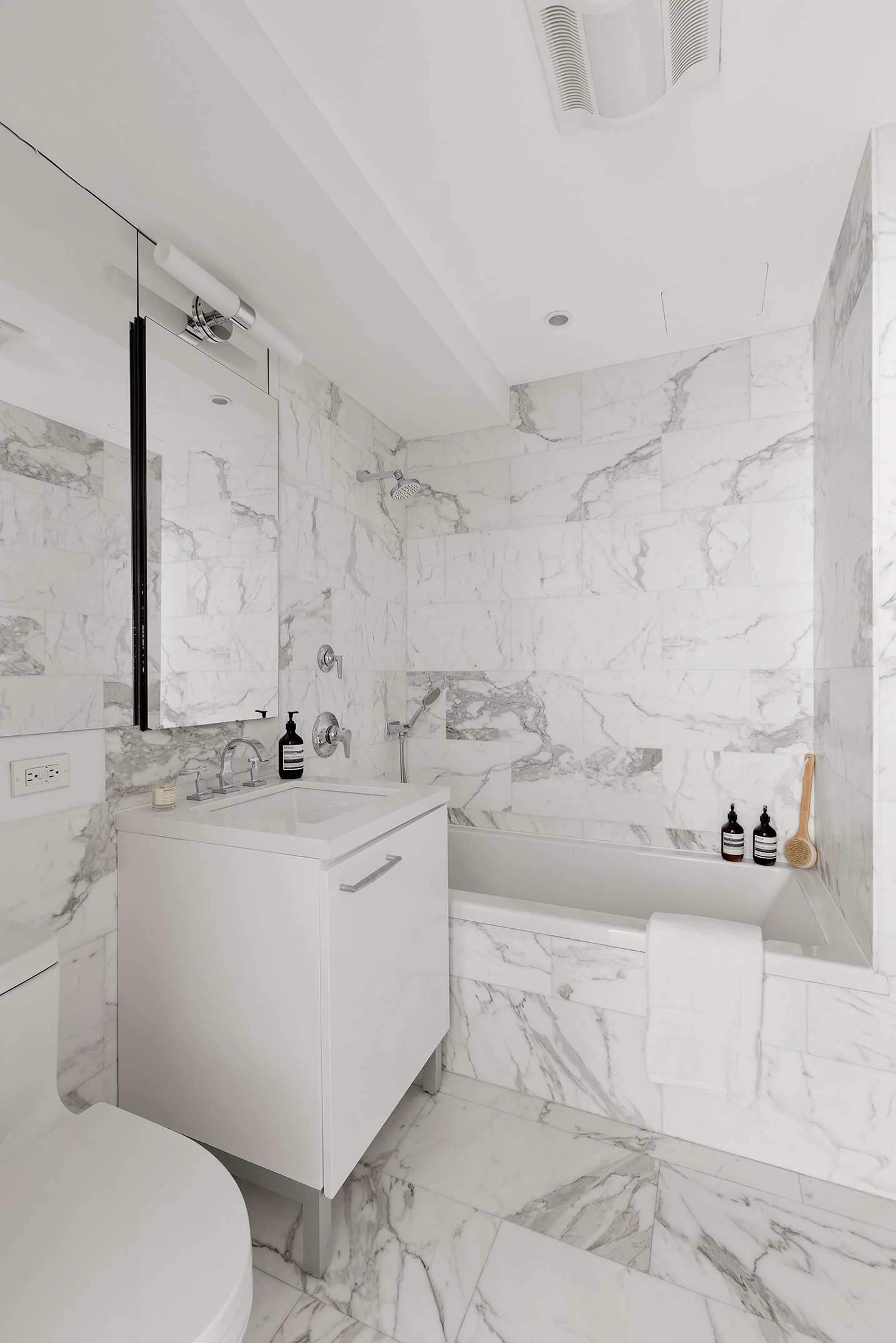 151 West 21st Street, Unit 9C Manhattan, NY 10011 - Photo 6 of 10 a view of bathroom with bathtub and mirror
