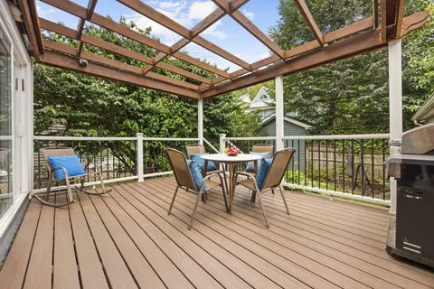 a view of a chairs and table on the wooden floor