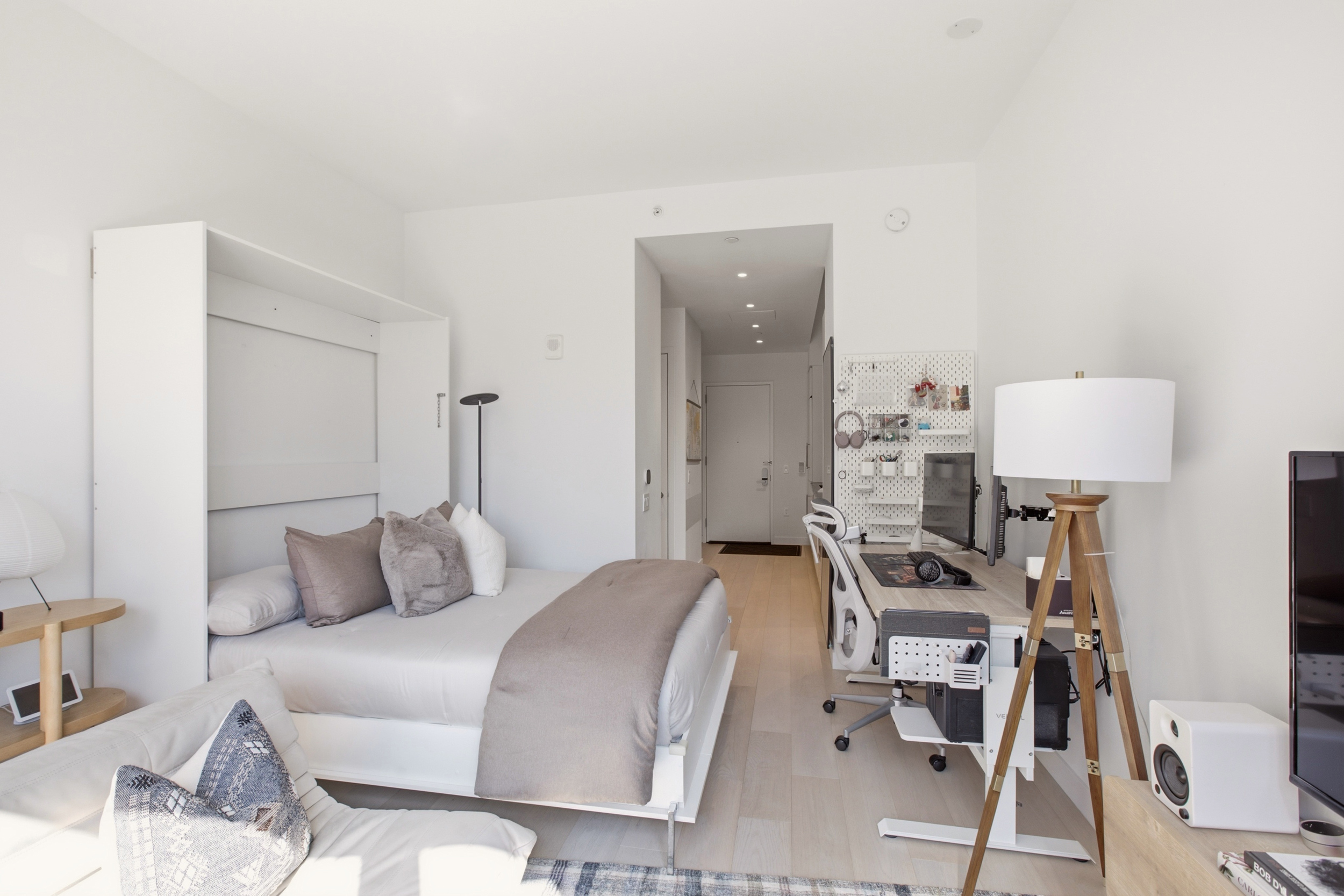 11 Hoyt Street, Unit 14M Brooklyn, NY 11201 - Photo 5 of 22 a bedroom with a bed and a chair