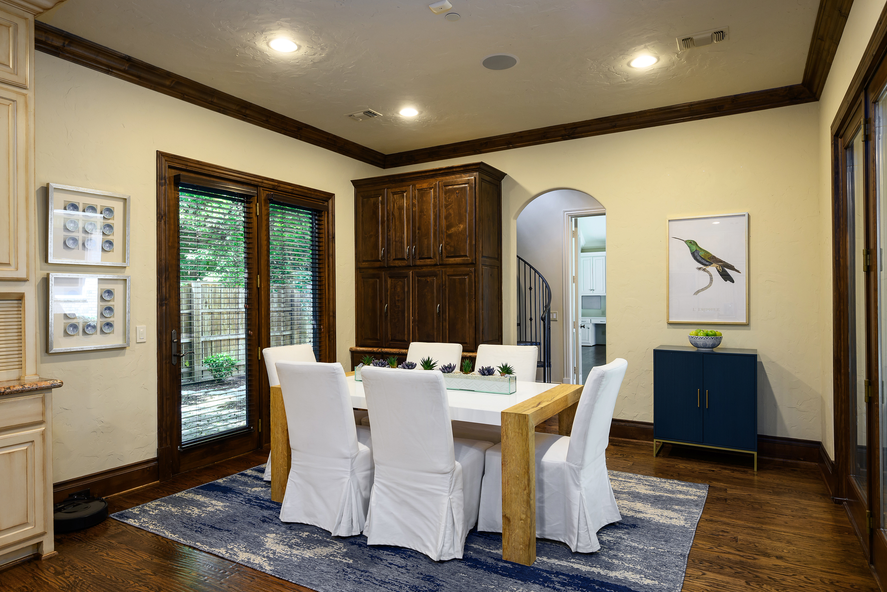11503 West Ricks Circle Dallas, TX 75230 - Photo 18 of 39 a dining room with furniture window and wooden floor