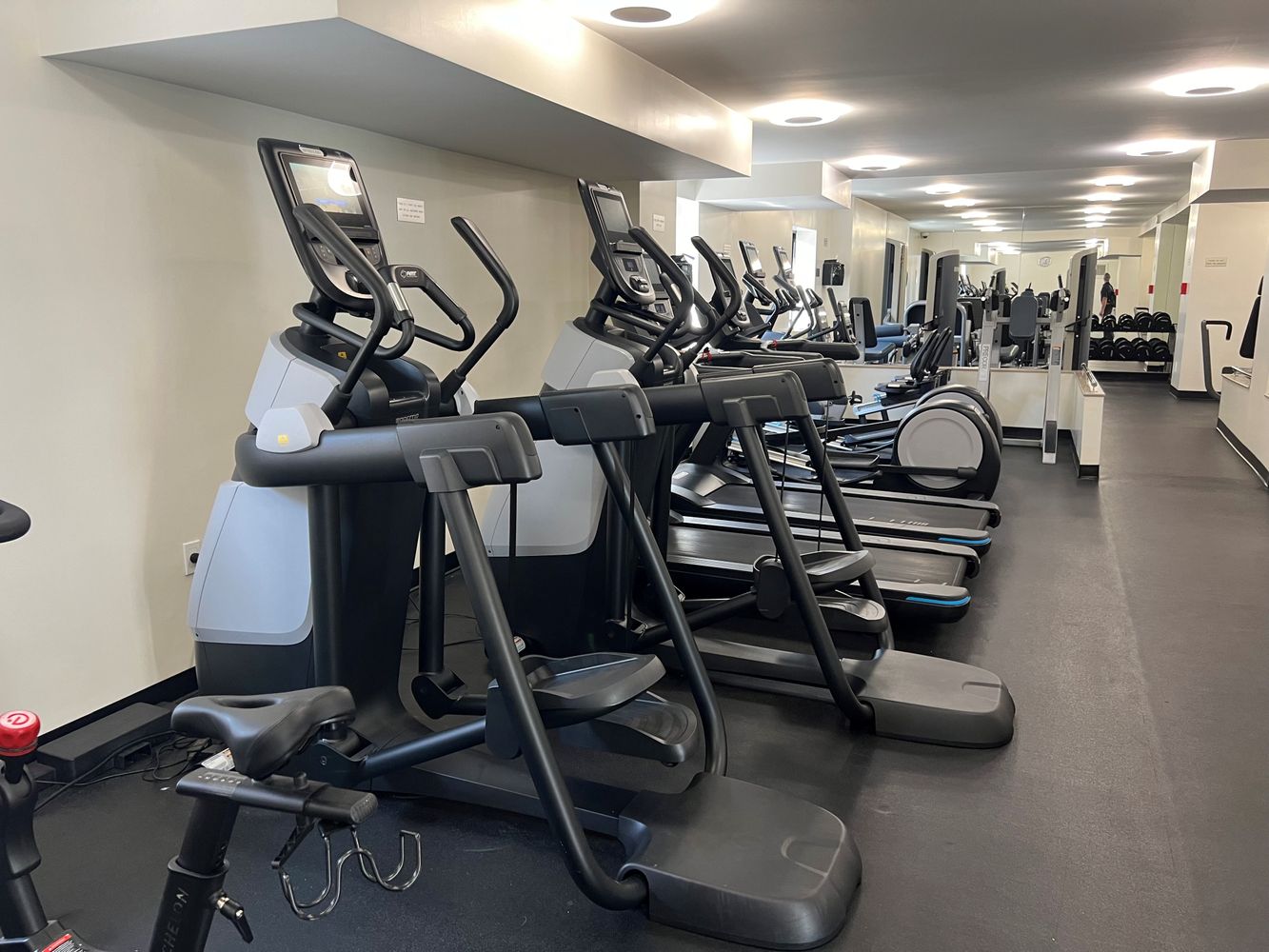 a dining room with a large window and table