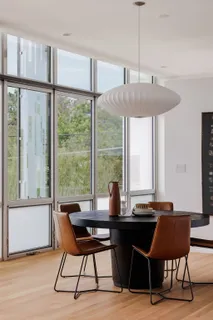 a view of a livingroom with furniture and a window