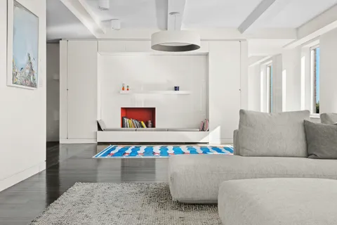 a living room with furniture and a couch