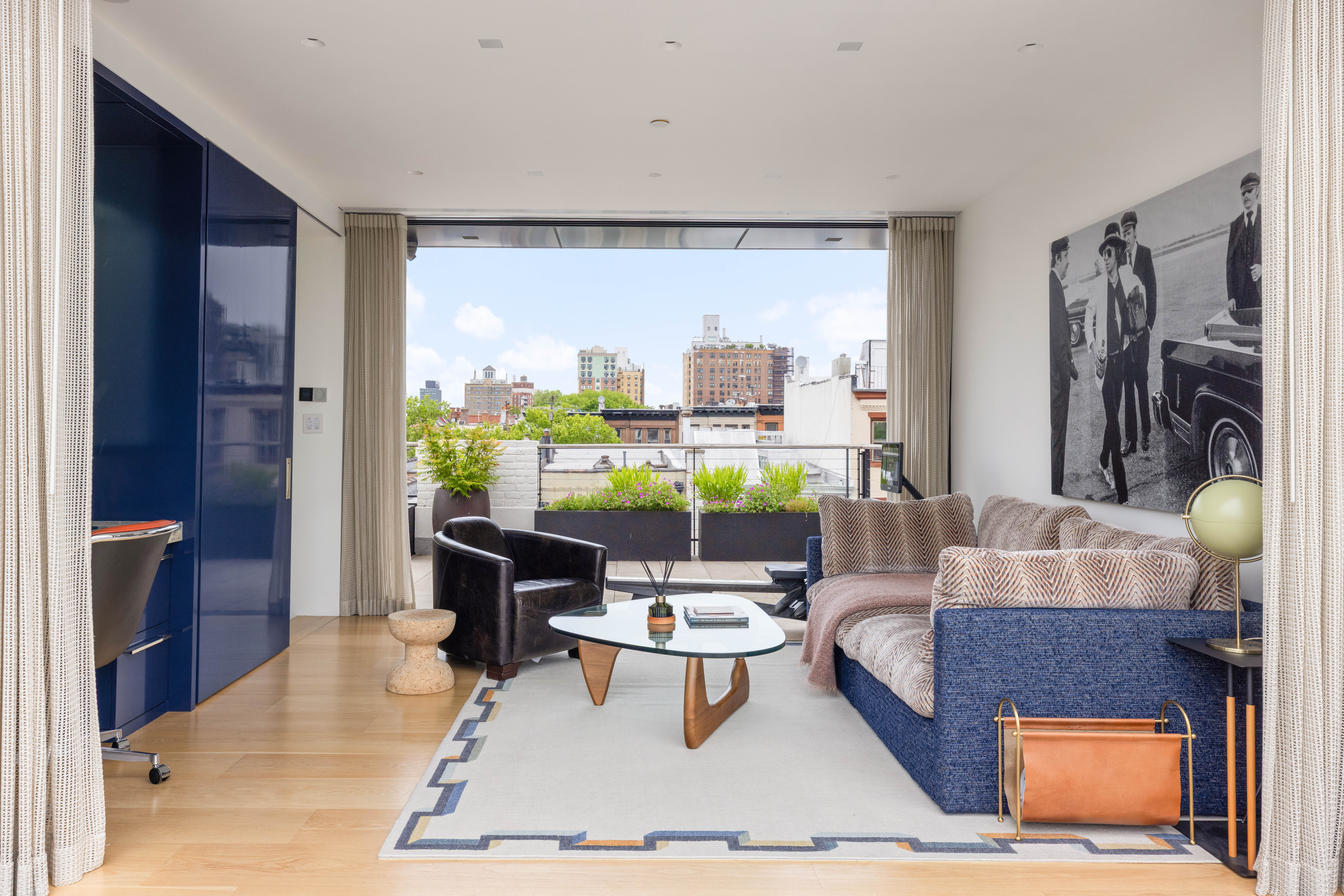 535 1st Street Brooklyn, NY 11215 - Photo 24 of 36 a living room with furniture and a large window