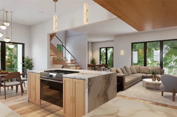 a living room with furniture a table and chairs