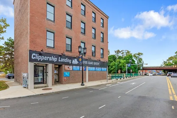 a view of a building with a street