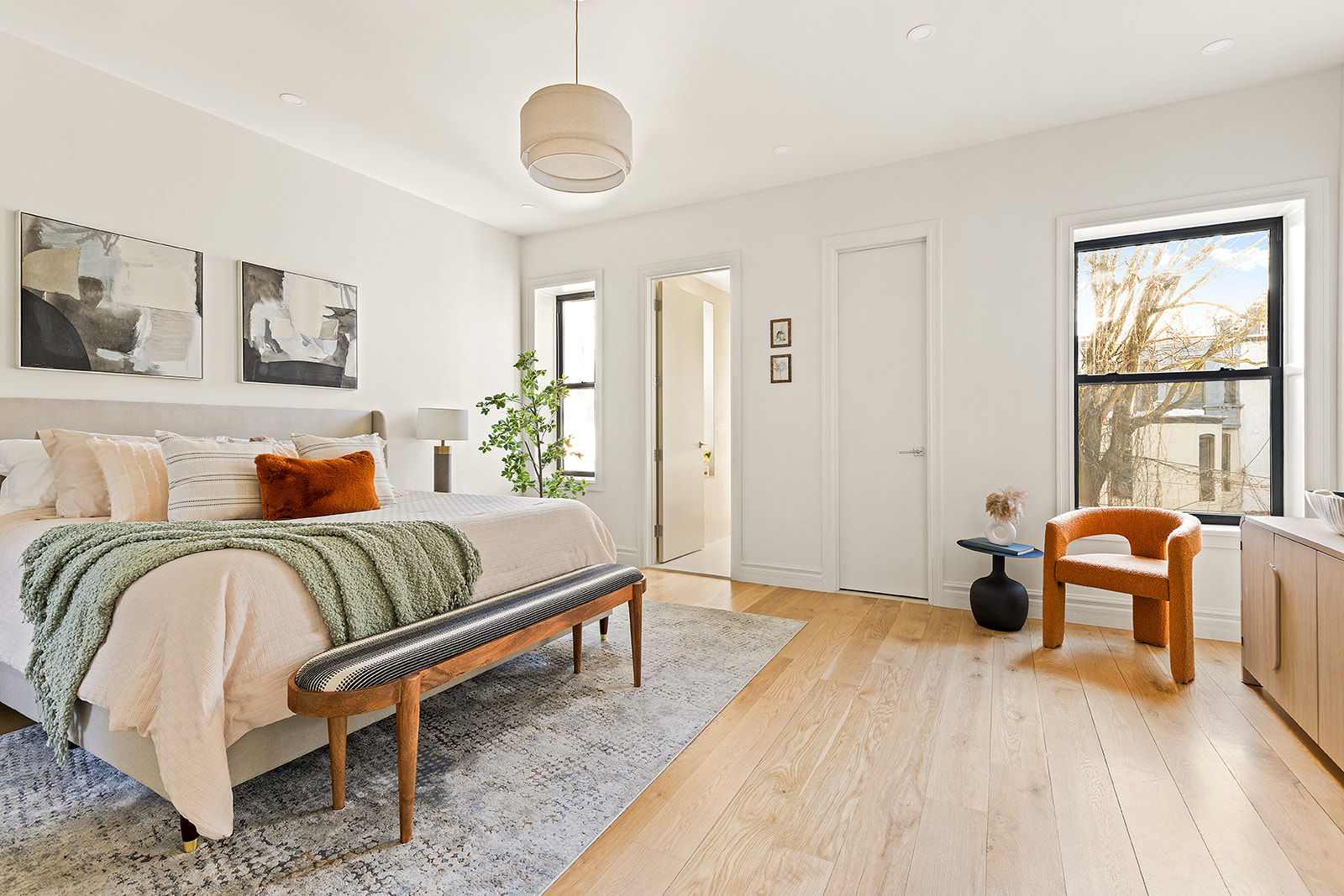 966 St Johns Place Brooklyn, NY 11213 - Photo 9 of 20 a bedroom with a bed and wooden floor