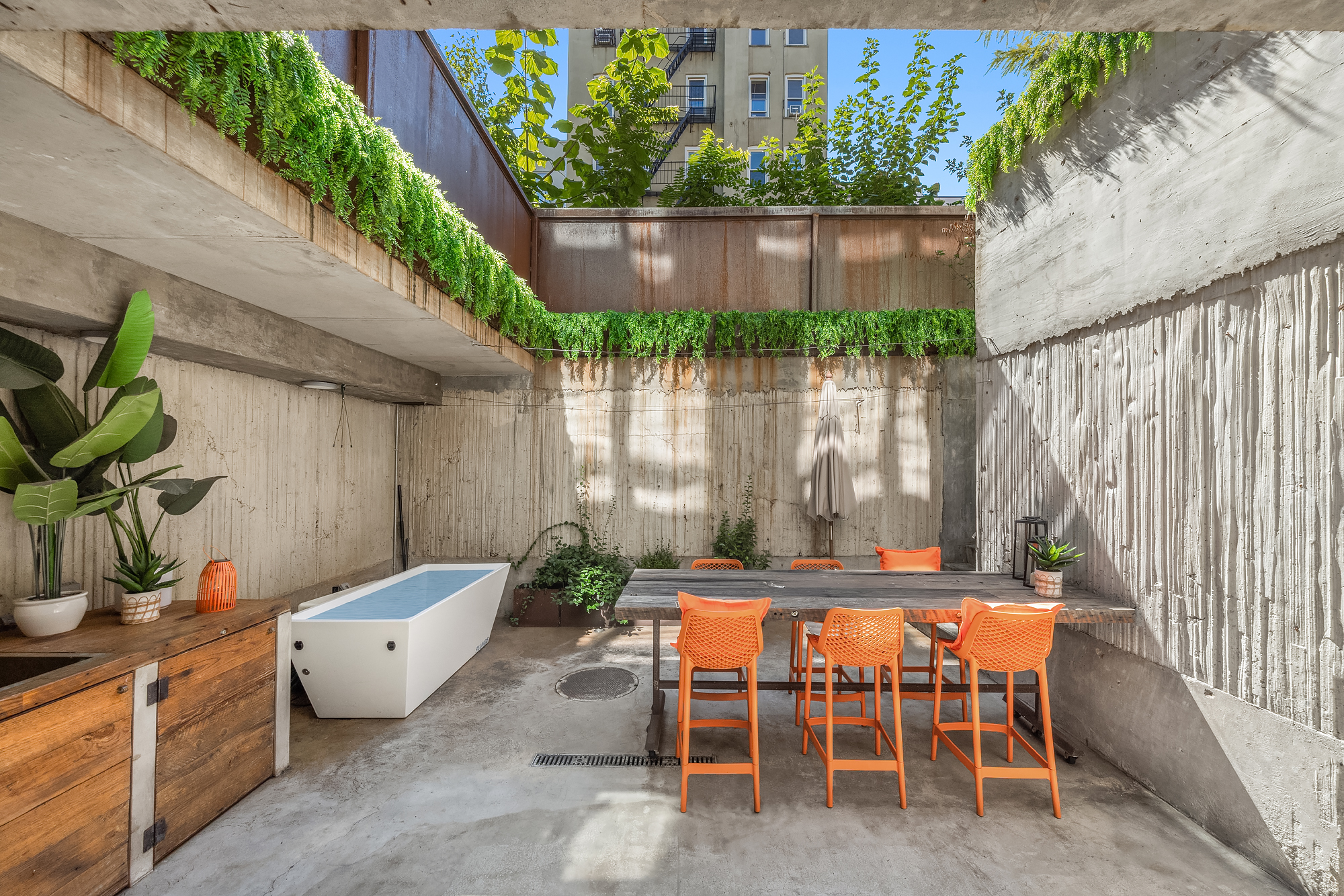 126 South 2nd Street, Unit GARDEN Brooklyn, NY 11249 - Photo 24 of 30 an outdoor sitting area with furniture