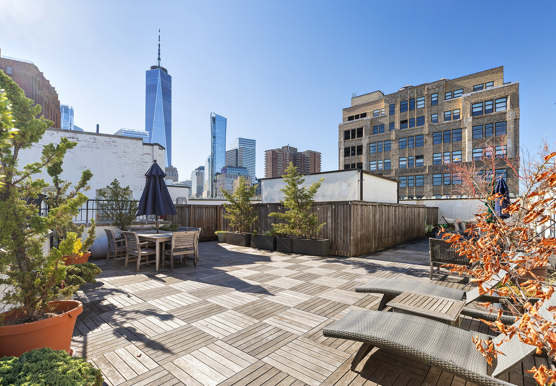 100 Hudson Street, Unit 7BC Manhattan, NY 10013 - Photo 18 of 20 a view of a patio with a table and chairs