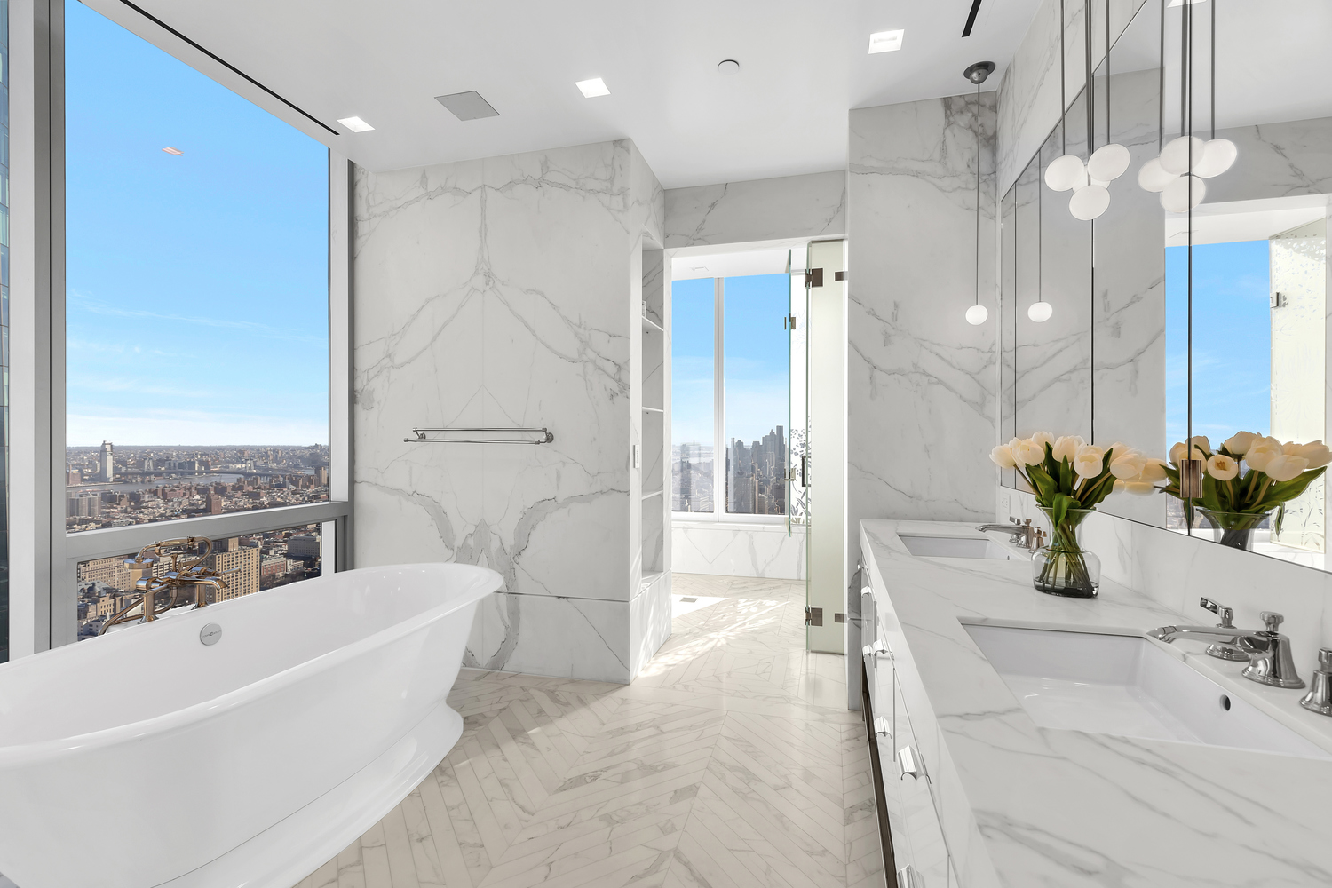 23 East 22nd Street, Unit PH Manhattan, NY 10010 - Photo 10 of 32 a bathroom with a bathtub and a sink