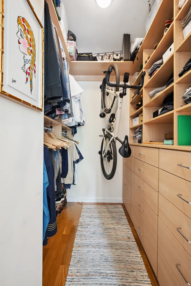 a view of an entryway with wooden floor