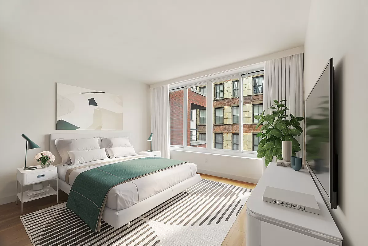 84 White Street, Unit 5B Manhattan, NY 10013 - Photo 3 of 7 a bedroom with a bed and a large window