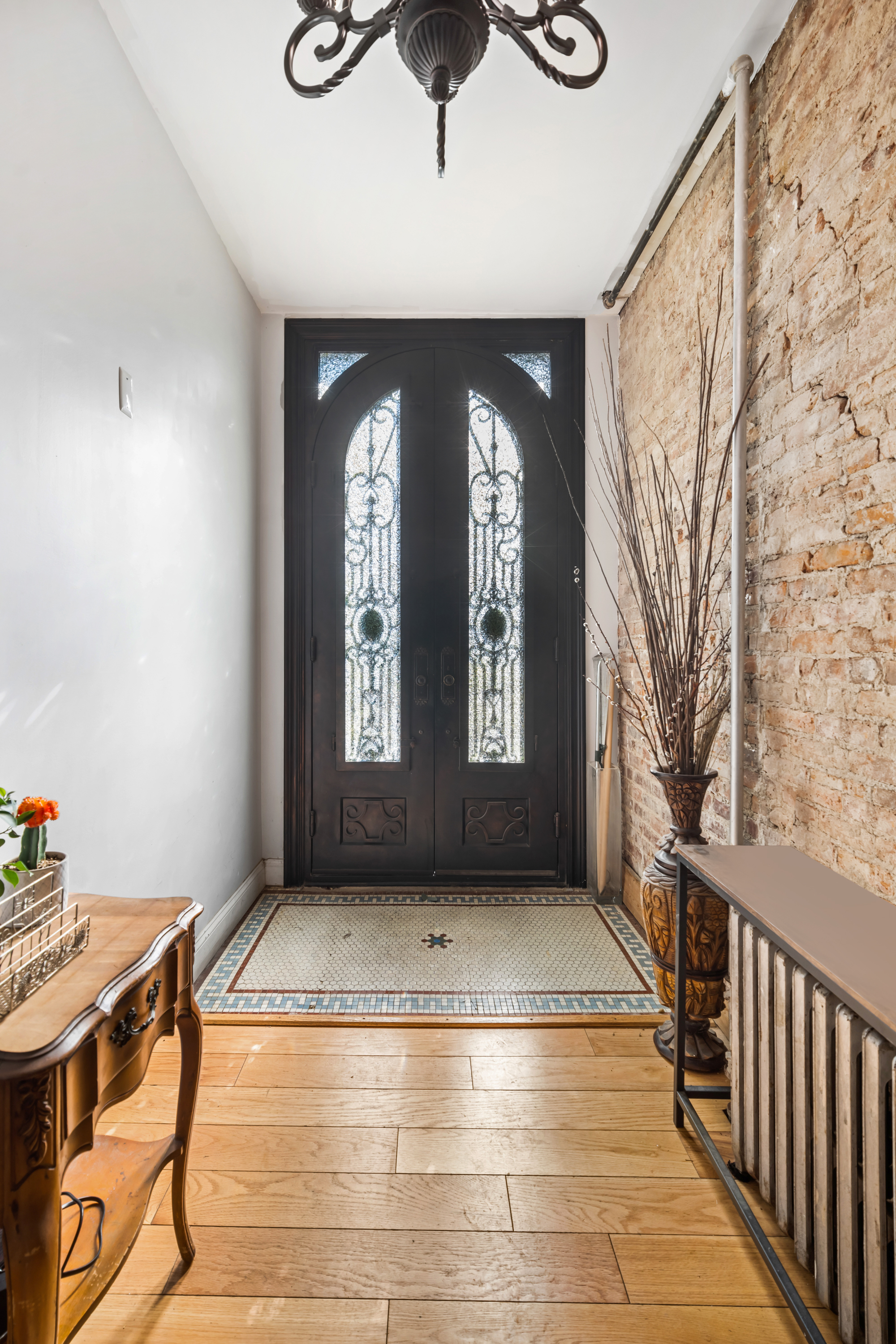60-13 Menahan Street, Unit 1 Queens, NY 11385 - Photo 17 of 19 a view of entryway with a front door