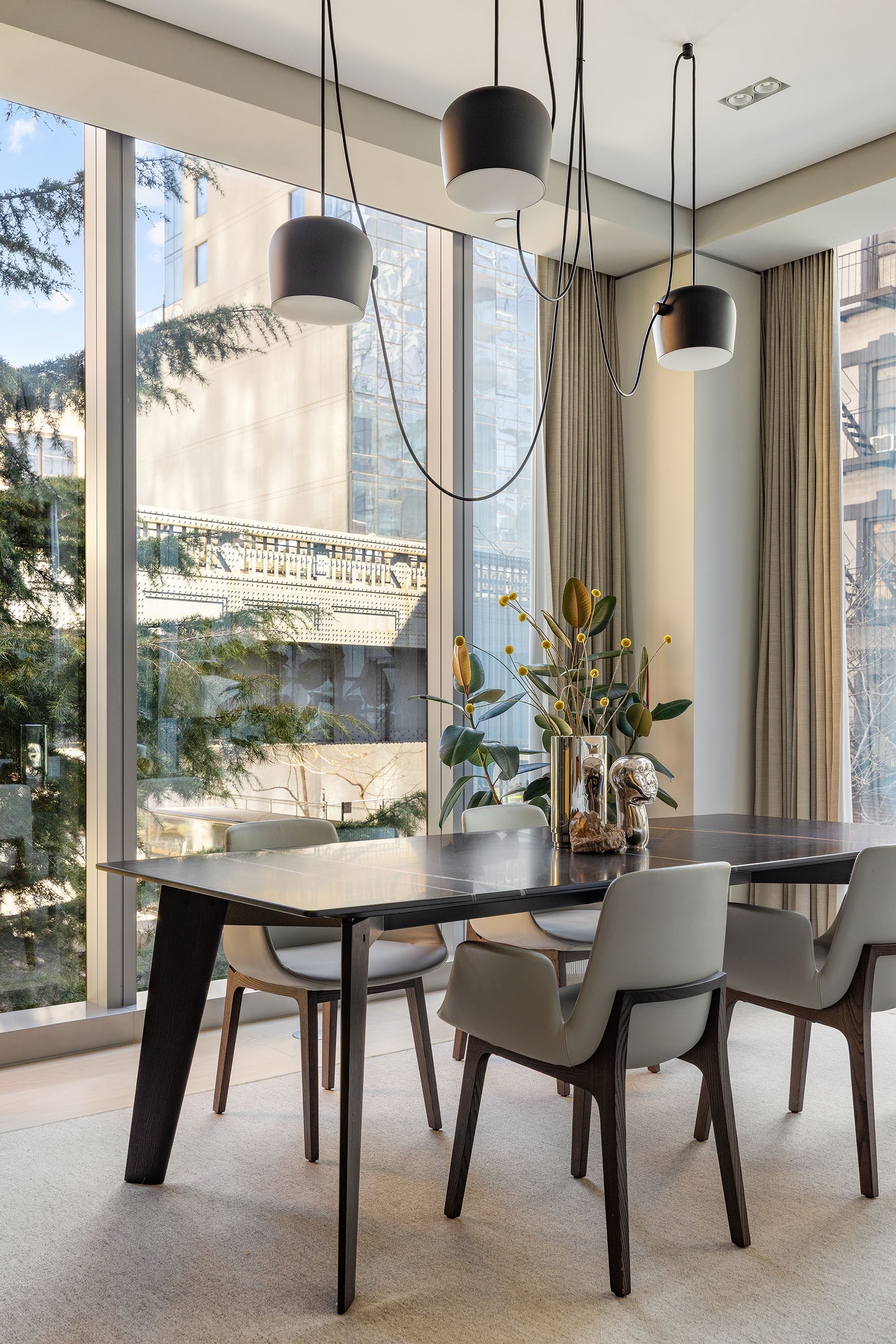 515 West 29th Street, Unit 2S Manhattan, NY 10001 - Photo 3 of 11 a dining room with furniture and window