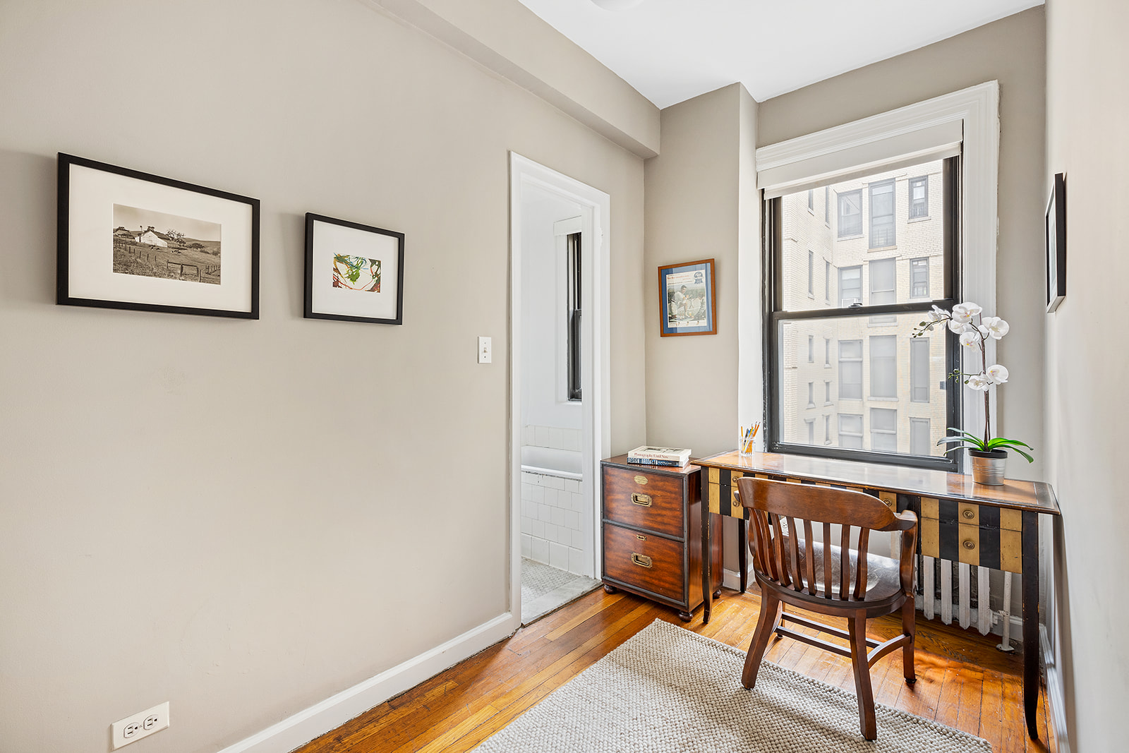 135 Eastern Parkway, Unit 13E Brooklyn, NY 11238 - Photo 8 of 15 a view of a bedroom with furniture window and wooden floor