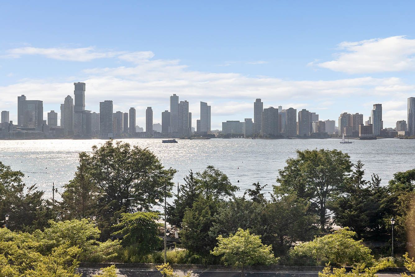 a view of a lake and city