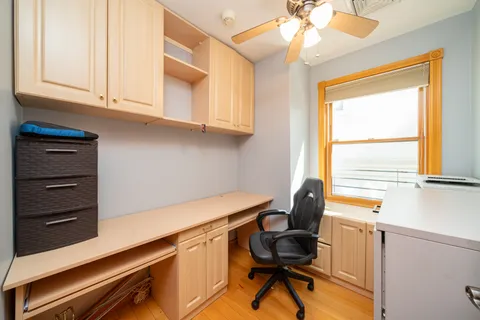 a room with furniture and a window