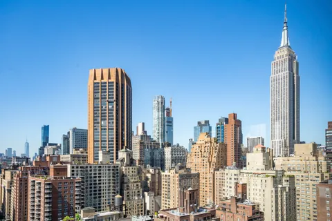 a view of city with tall buildings