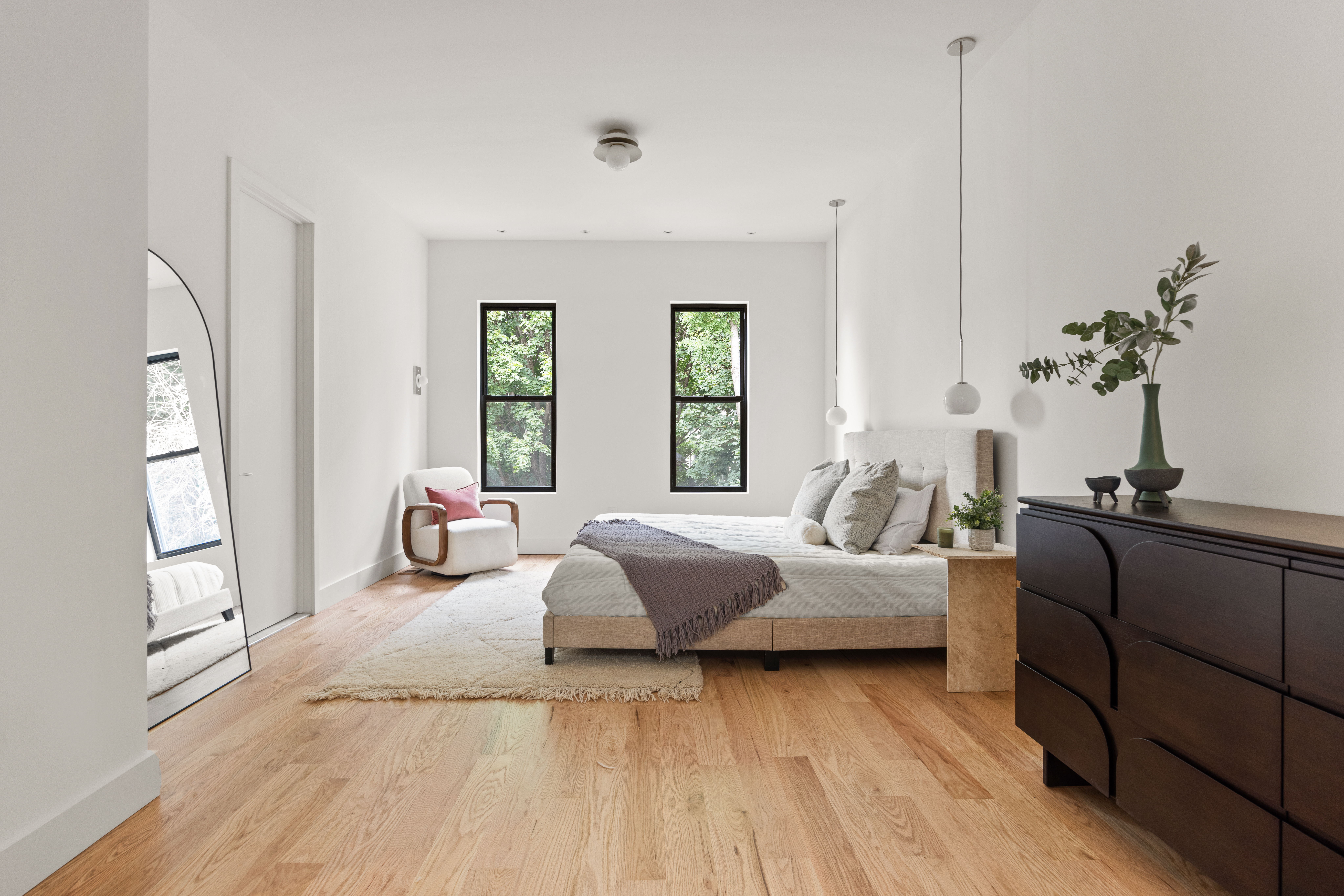 737 Decatur Street Brooklyn, NY 11233 - Photo 10 of 19 a bedroom with furniture and wooden floor