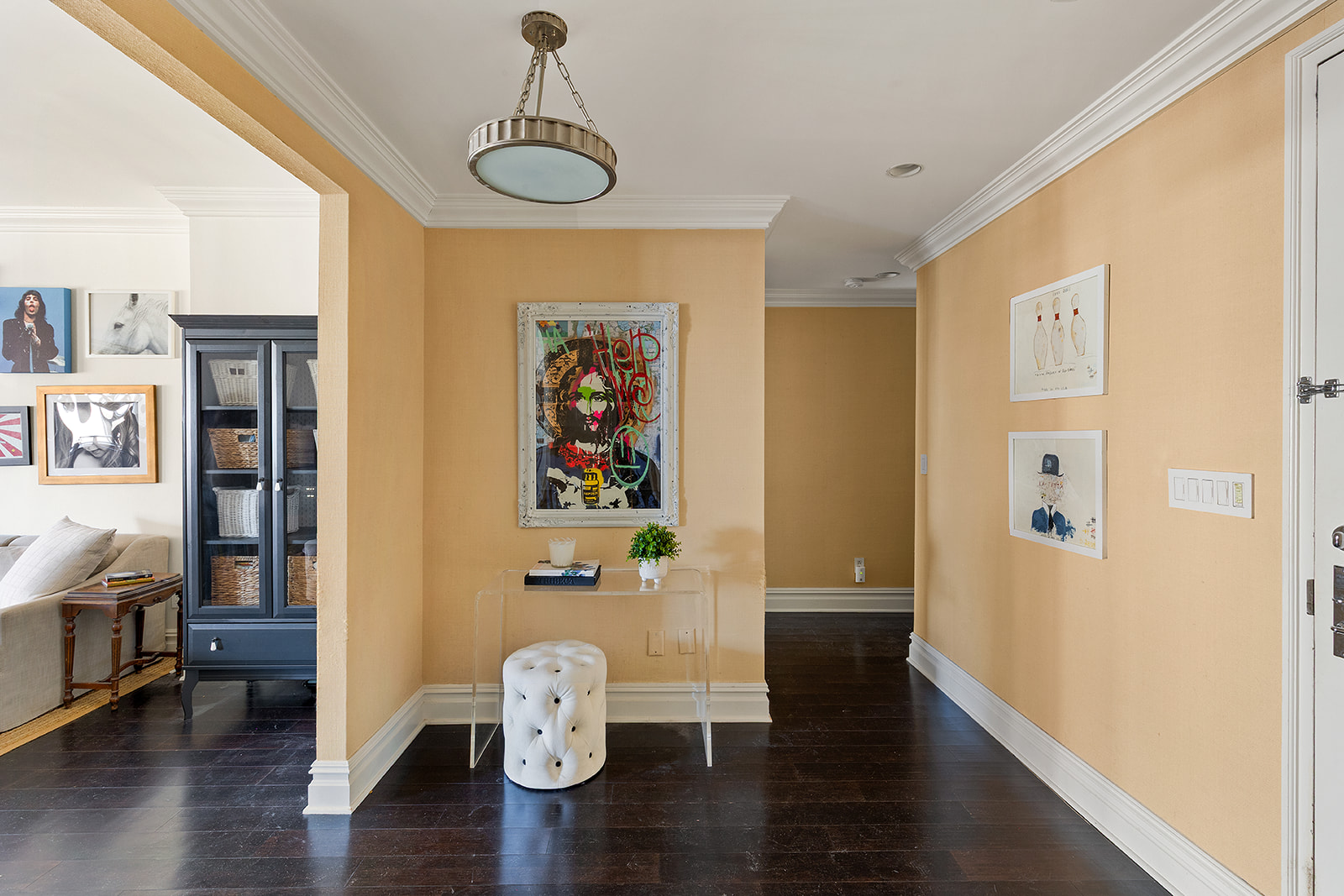 90 East End Avenue, Unit 4B Manhattan, NY 10028 - Photo 8 of 13 a view of a hallway with wooden floor and furniture