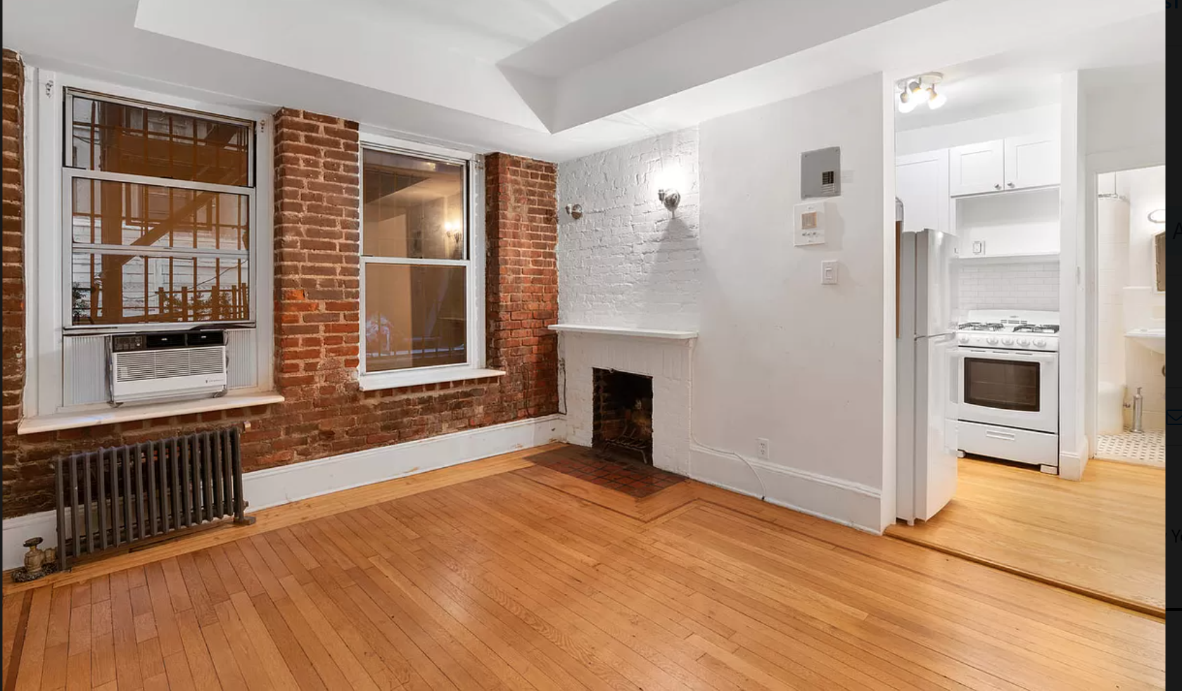 a view of a livingroom with a fireplace