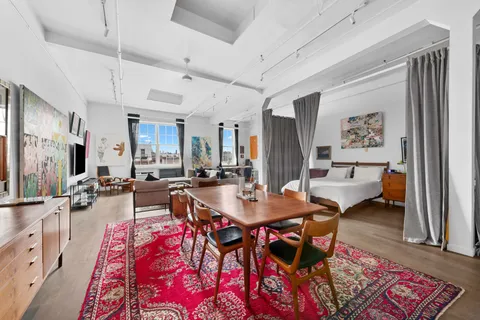 a view of a dining room with furniture