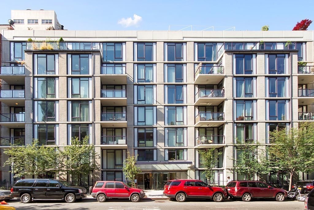 350 West 53rd Street, Unit THG Manhattan, NY 10019 - Photo 19 of 25 a cars parked in front of a building