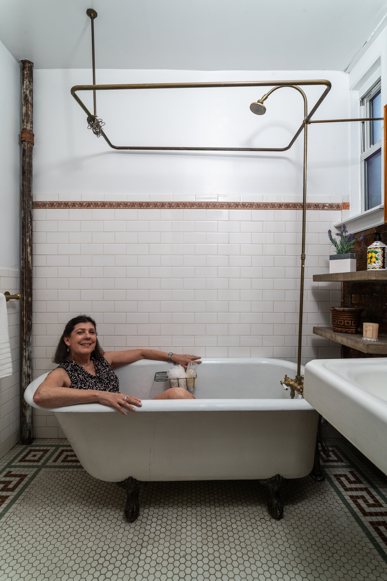 616 East 9th Street, Unit 4W Manhattan, NY 10009 - Photo 15 of 20 a bathroom with a bathtub and a shower