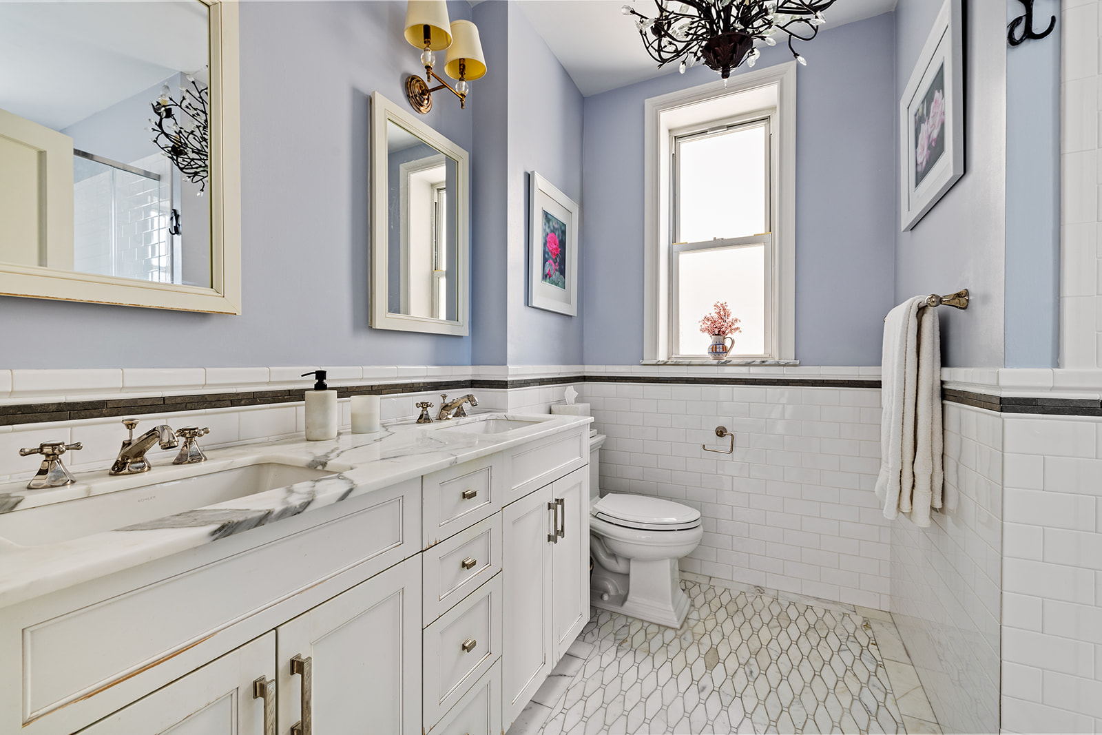 610 West 110th Street, Unit 4D Manhattan, NY 10025 - Photo 5 of 12 a bathroom with a sink a toilet and a mirror