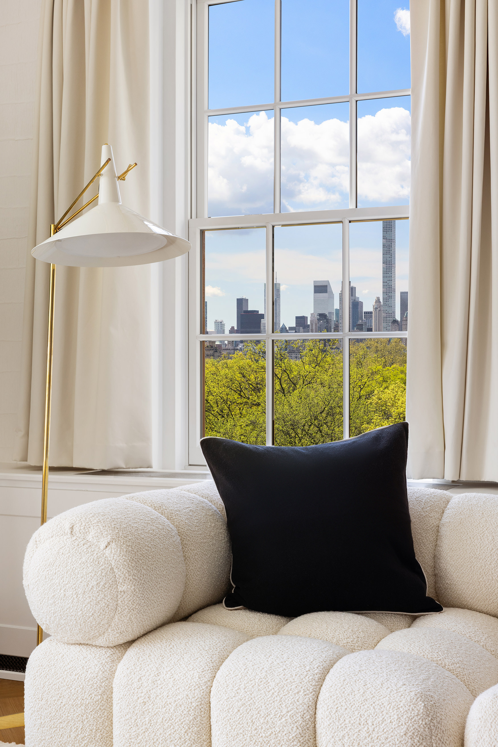 360 Central Park West, Unit 11C Manhattan, NY 10025 - Photo 4 of 17 a bed sitting in a bedroom next to a window