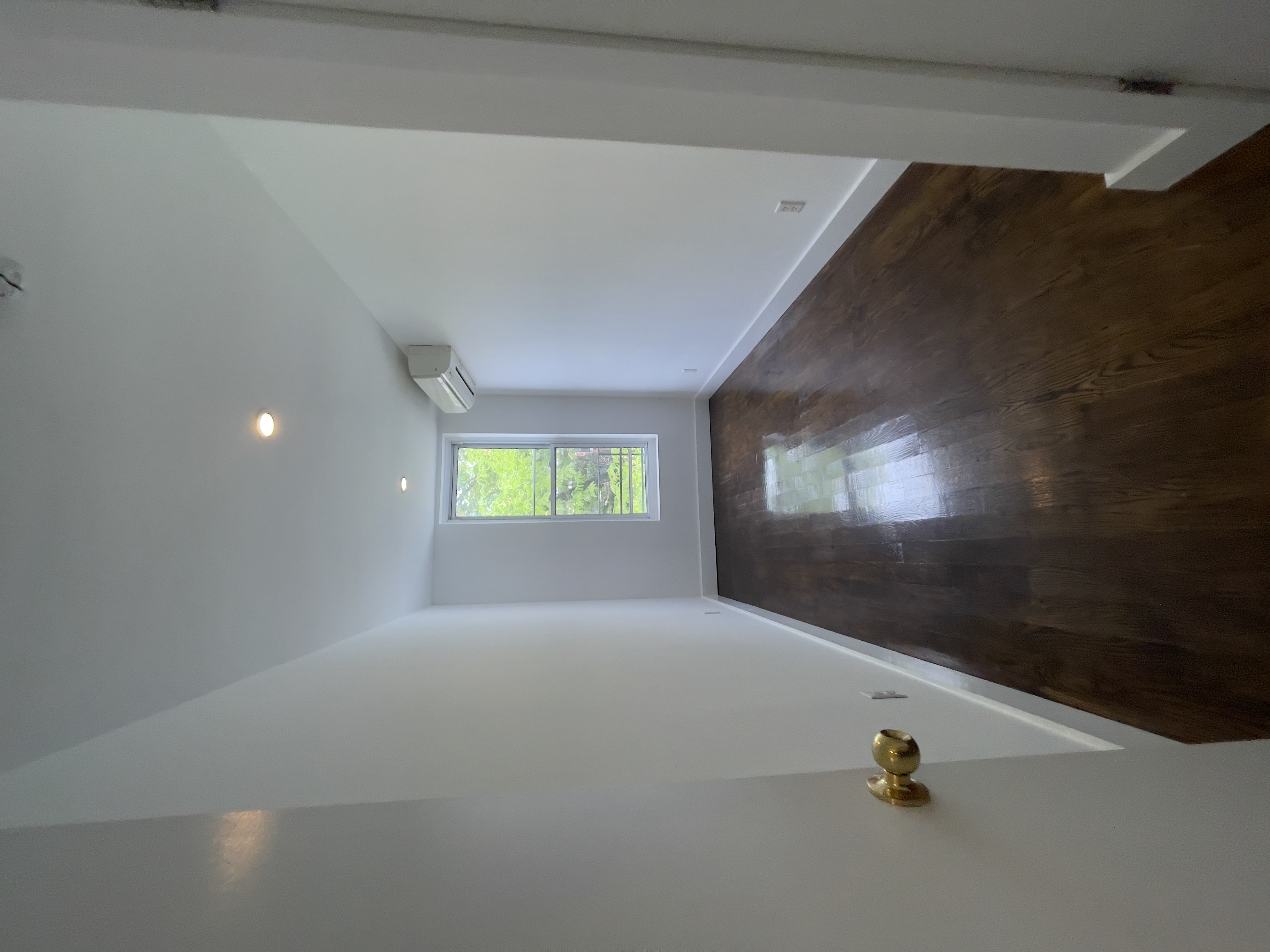 87 Douglass Street, Unit 2 Brooklyn, NY 11231 - Photo 11 of 16 wooden floor in an empty room with a window