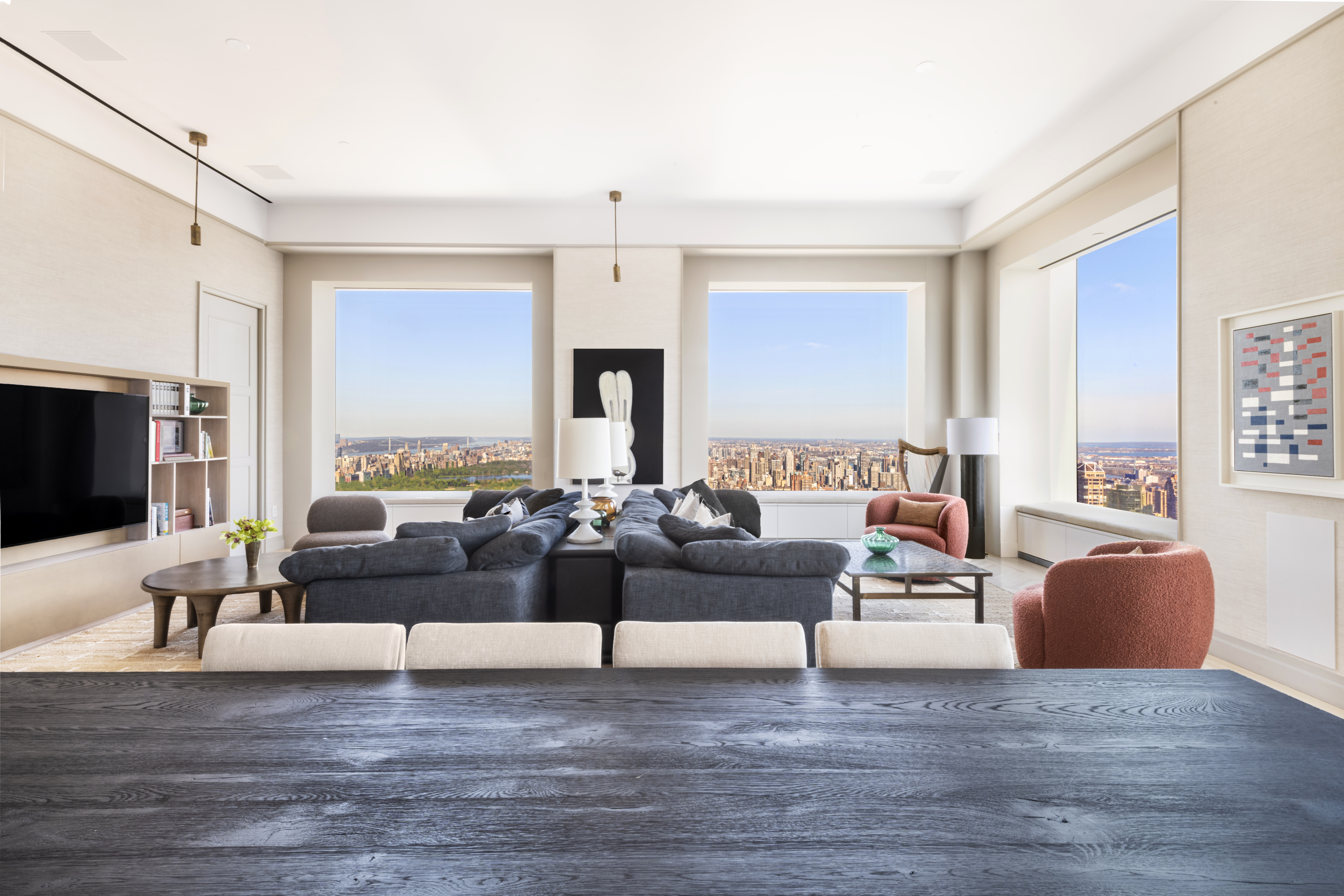 432 Park Avenue, Unit 55A Manhattan, NY 10022 - Photo 3 of 13 a living room with fireplace furniture and a flat screen tv