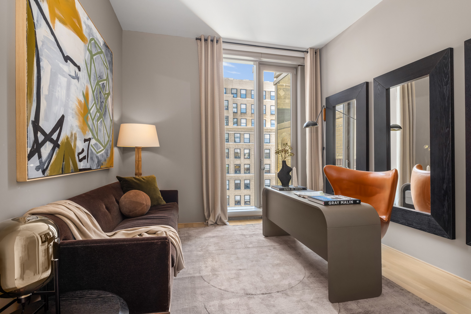 56 Leonard Street, Unit 14BEAST Manhattan, NY 10013 - Photo 13 of 35 a living room with furniture and a window