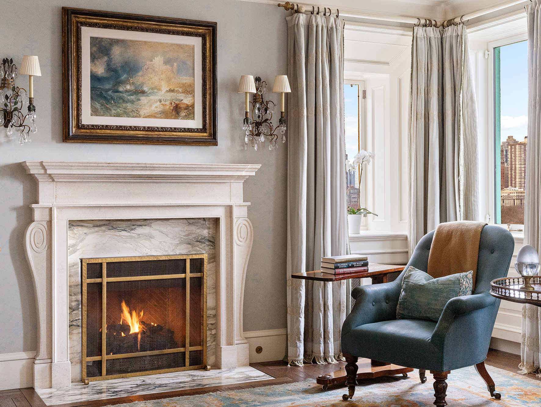 953 5th Avenue, Unit PH Manhattan, NY 10075 - Photo 12 of 27 a living room with furniture and a fireplace